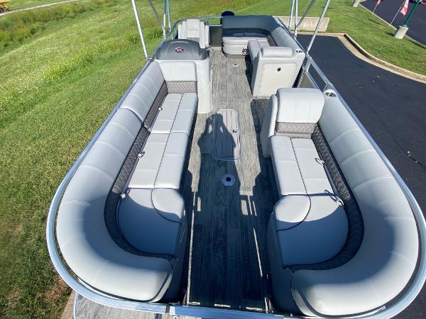 2024 Ranger Reata 223C pontoon boat with spacious seating and modern design.