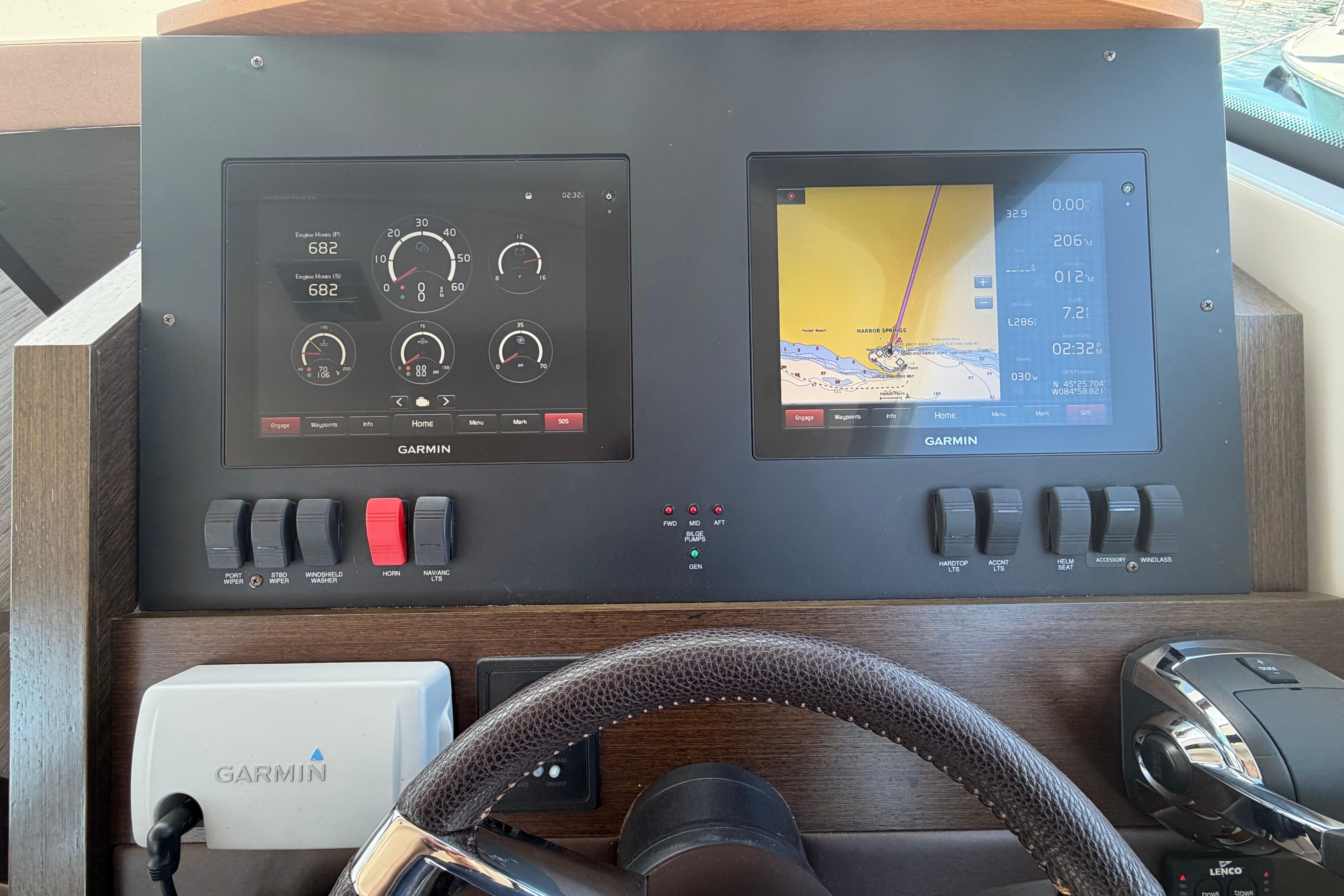 Dashboard of 2016 Tiara Yachts C39 Coupe with Garmin navigation displays.