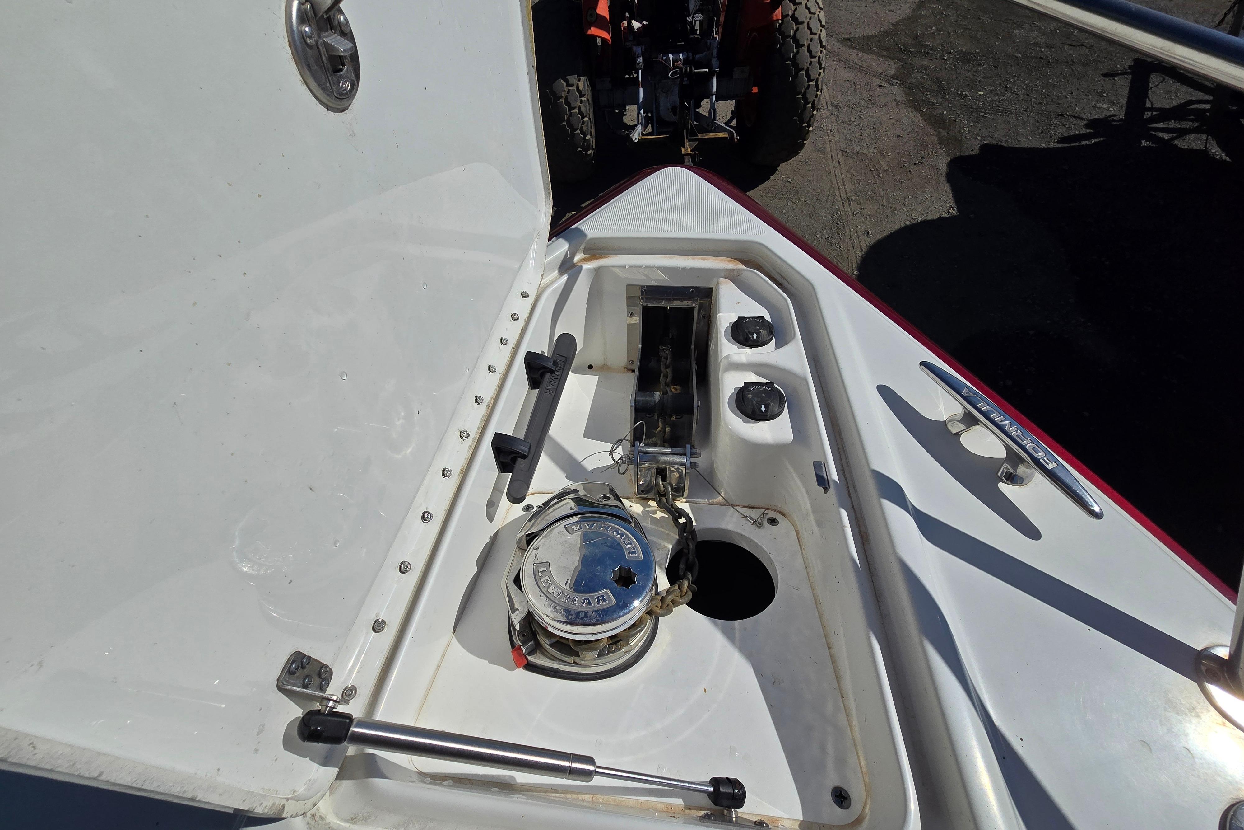 2017 Formula 310 Sun Sport boat anchor compartment with winch and controls.
