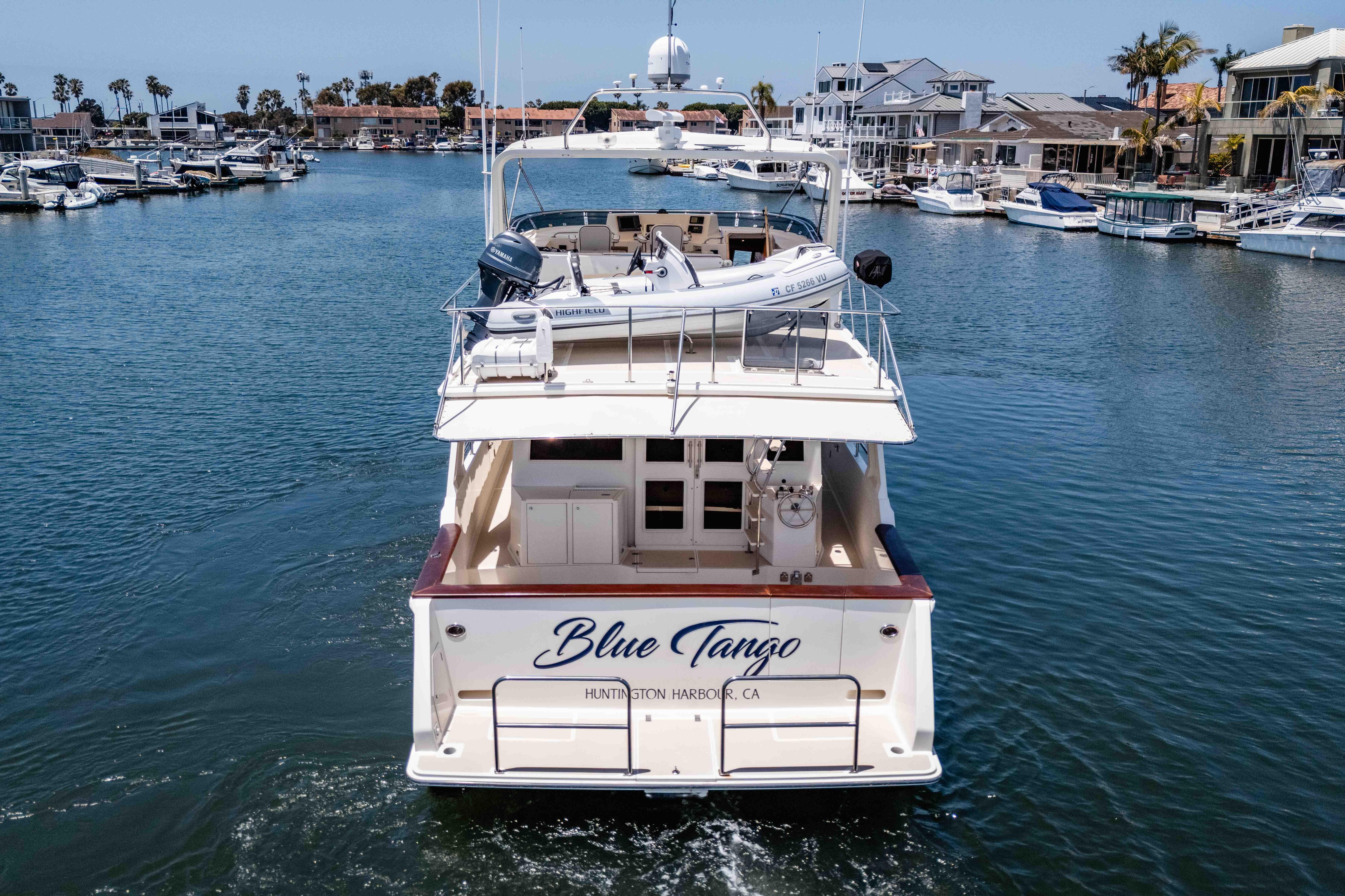 2005 Offshore Yachts 54 Pilothouse "Blue Tango" in Huntington Harbour marina.