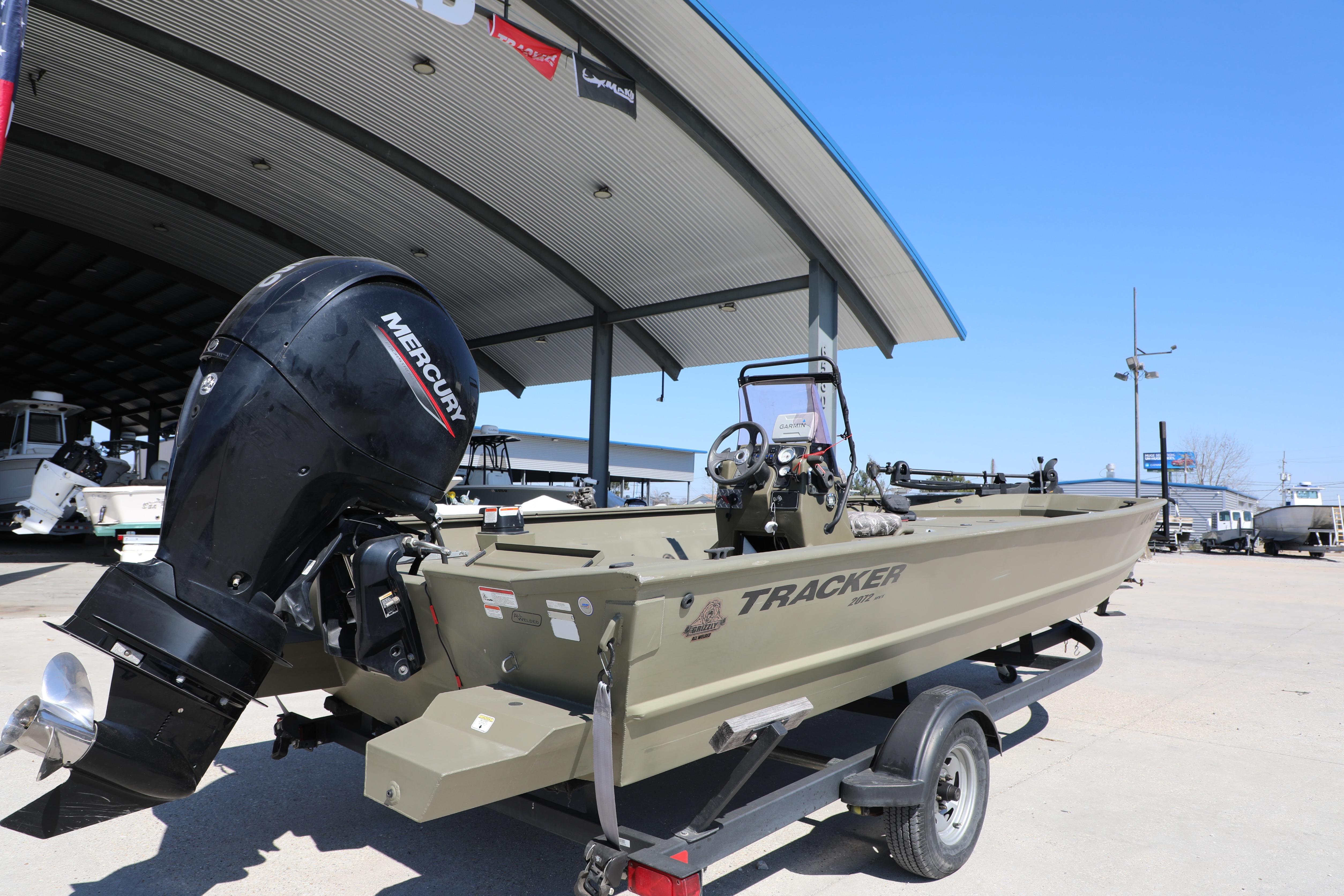 2021 Tracker Grizzly 2072 SC All-Welded boat with Mercury engine on trailer.
