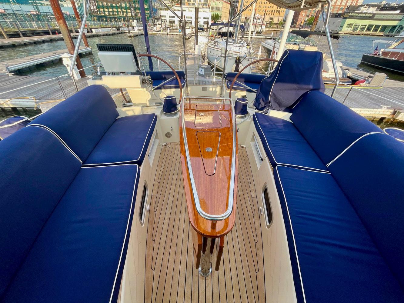 Interior of a 2010 Southerly 57 RS yacht with blue cushions.