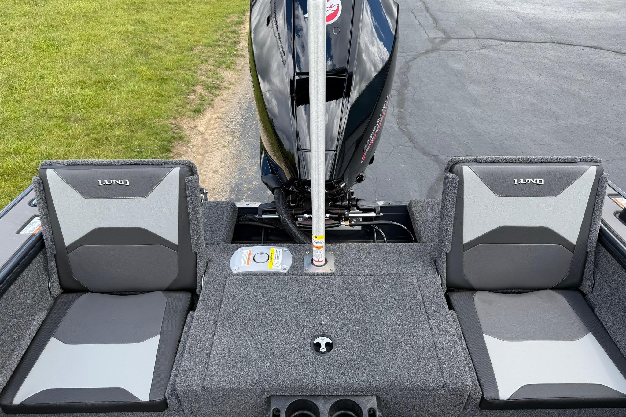 2027 Lund 1875 Crossover XS boat seats and motor, showcasing modern design and functionality.