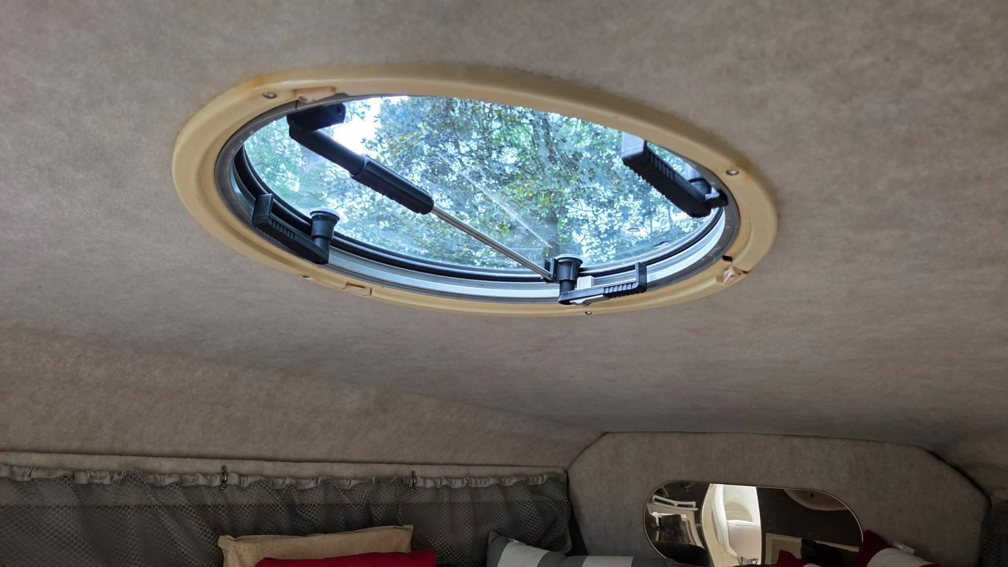 Interior of a 2006 Stingray 250 CR with a round skylight.