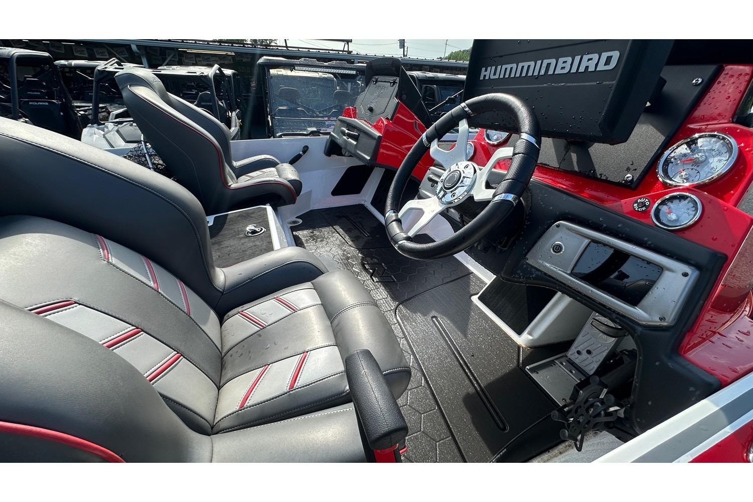 2023 Nitro Z20 Pro boat interior with steering wheel and seats, featuring Humminbird electronics.