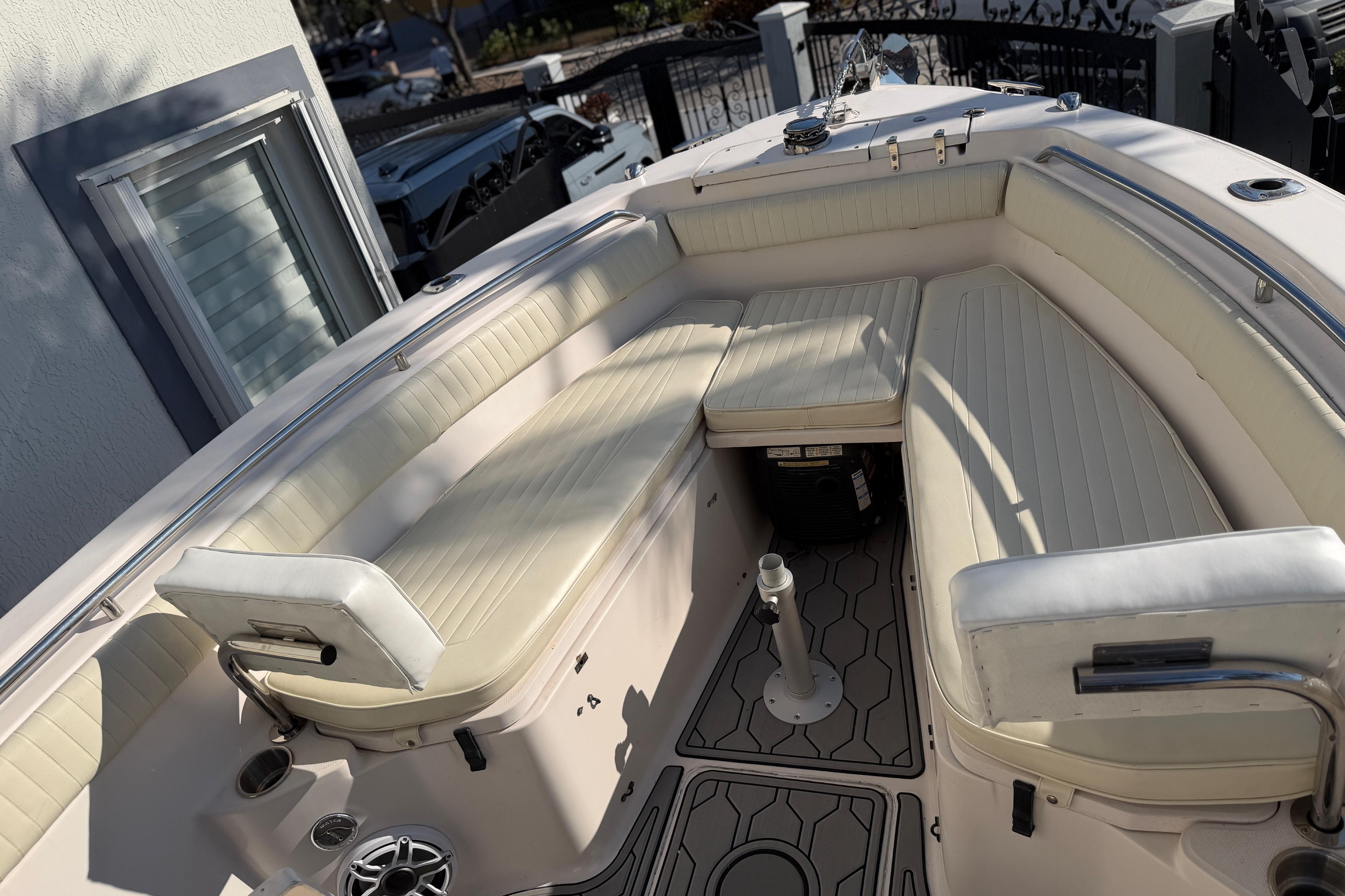 2004 Grady White 273 boat interior with cushioned seating and modern design.