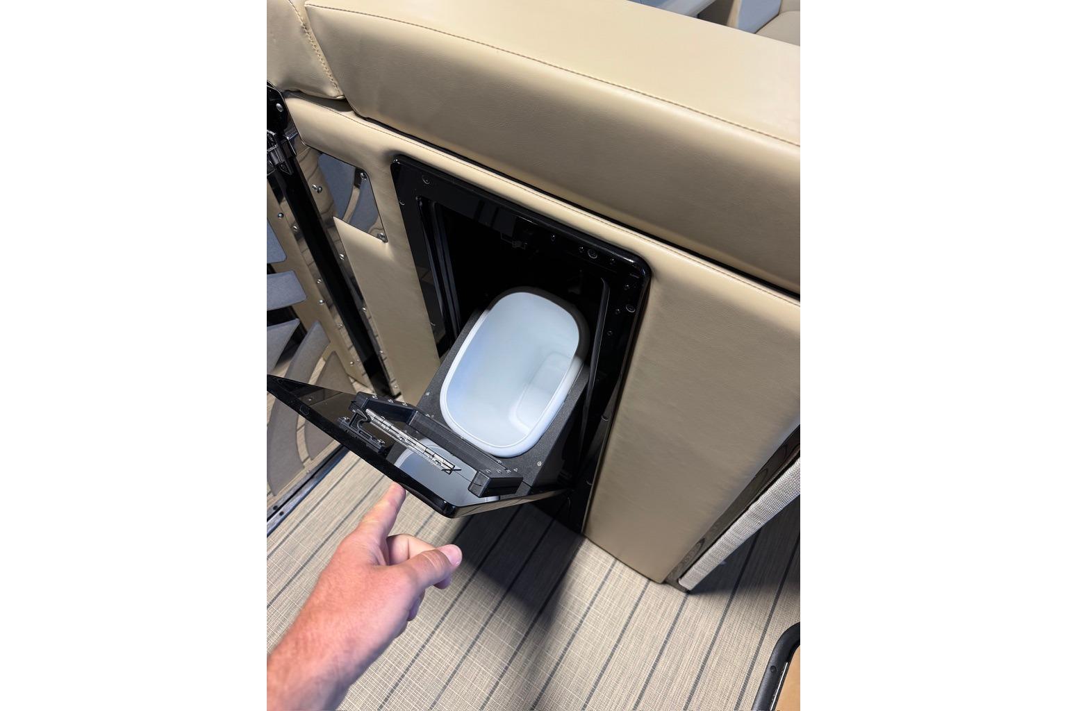 Built-in cooler compartment on Balise Halo 26C Twin boat, 2026 model.