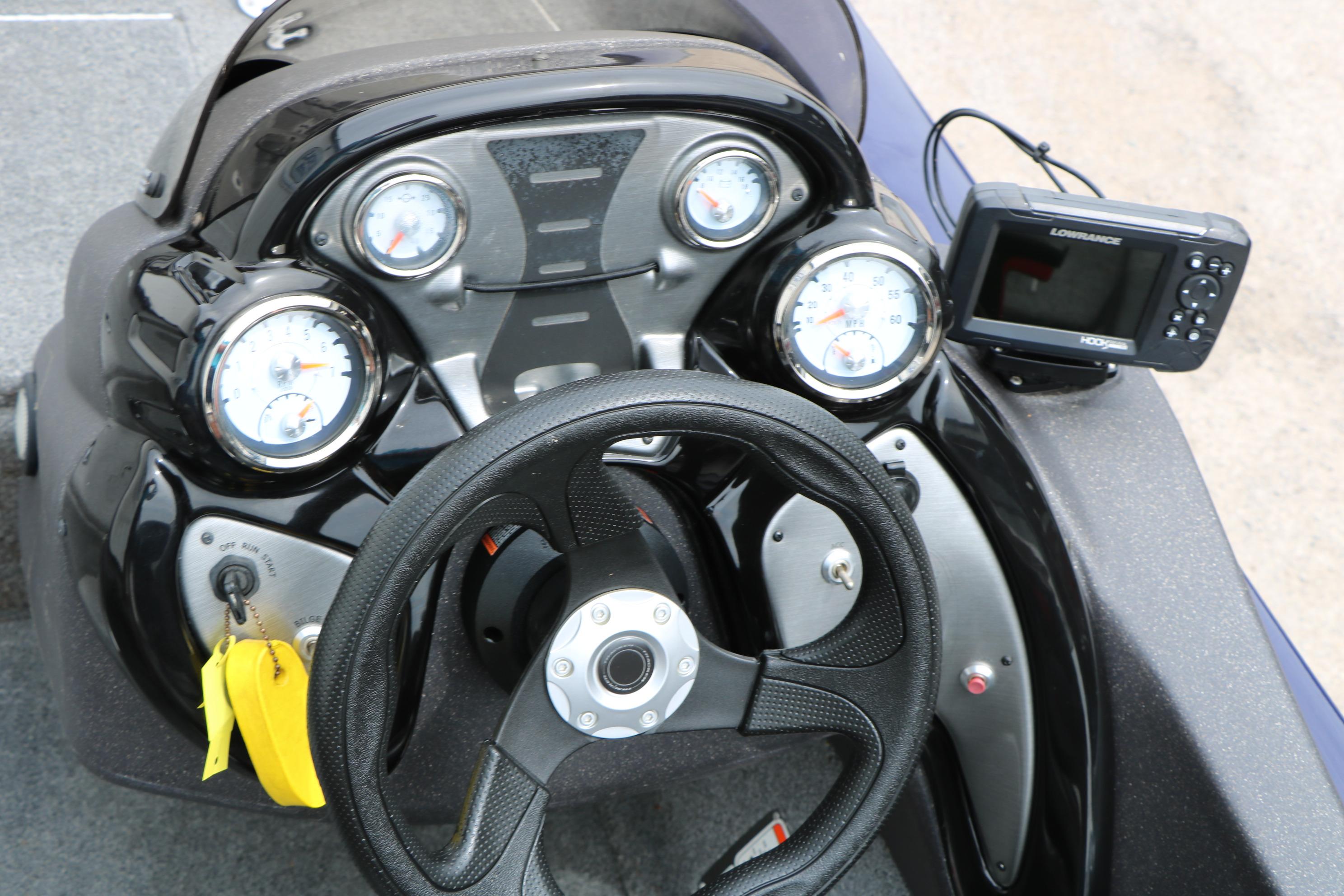 2022 Tracker Pro Team 175 TF dashboard with gauges and Lowrance fishfinder.