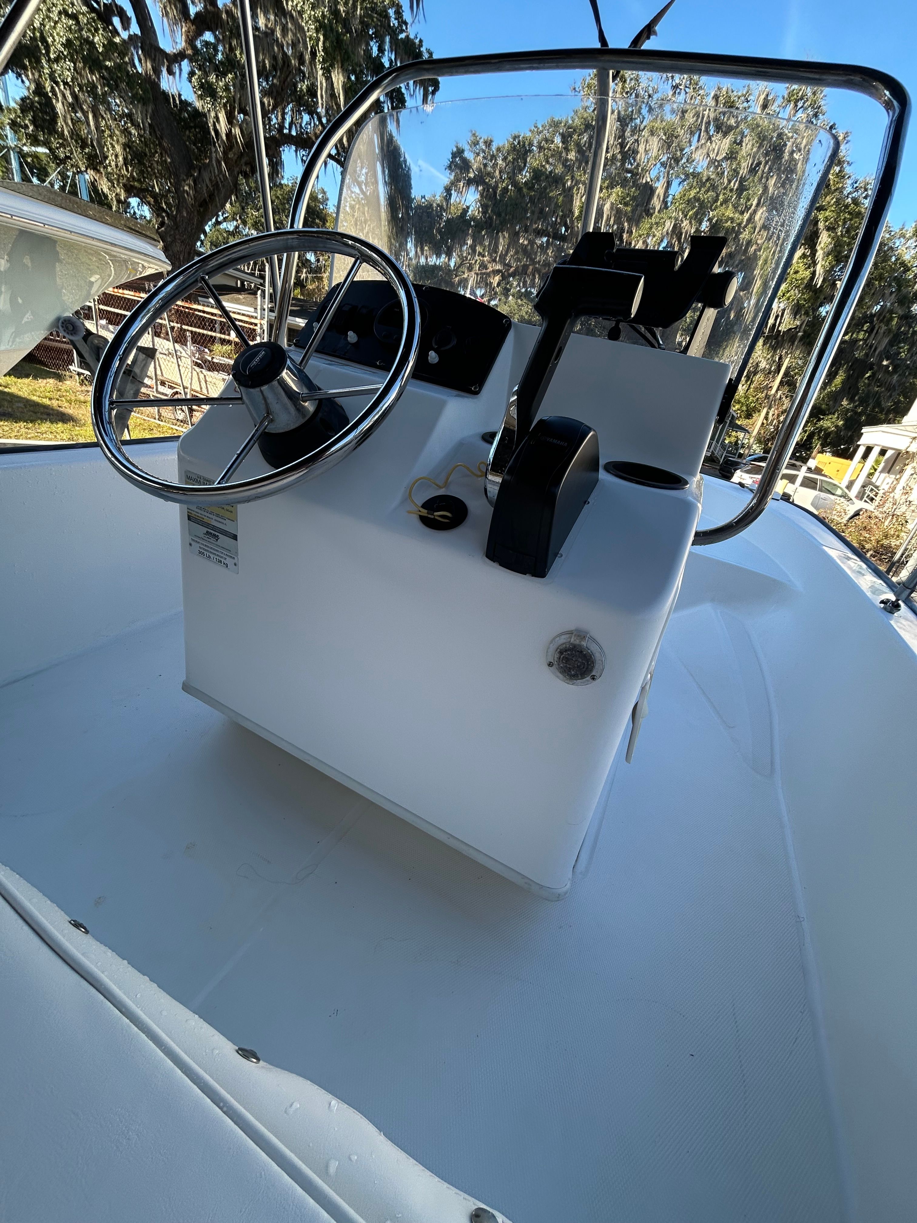 2006 Boston Whaler 150 Montauk steering console on boat.