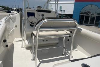 2023 Sailfish 242 CC boat interior with steering console and seating.