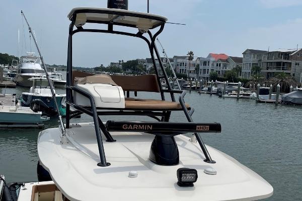 2020 Scout 420 LXF boat with Garmin radar, docked in a marina.