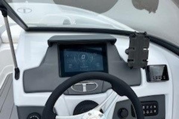 2024 Tahoe 210 Si boat dashboard with modern controls and touchscreen display.