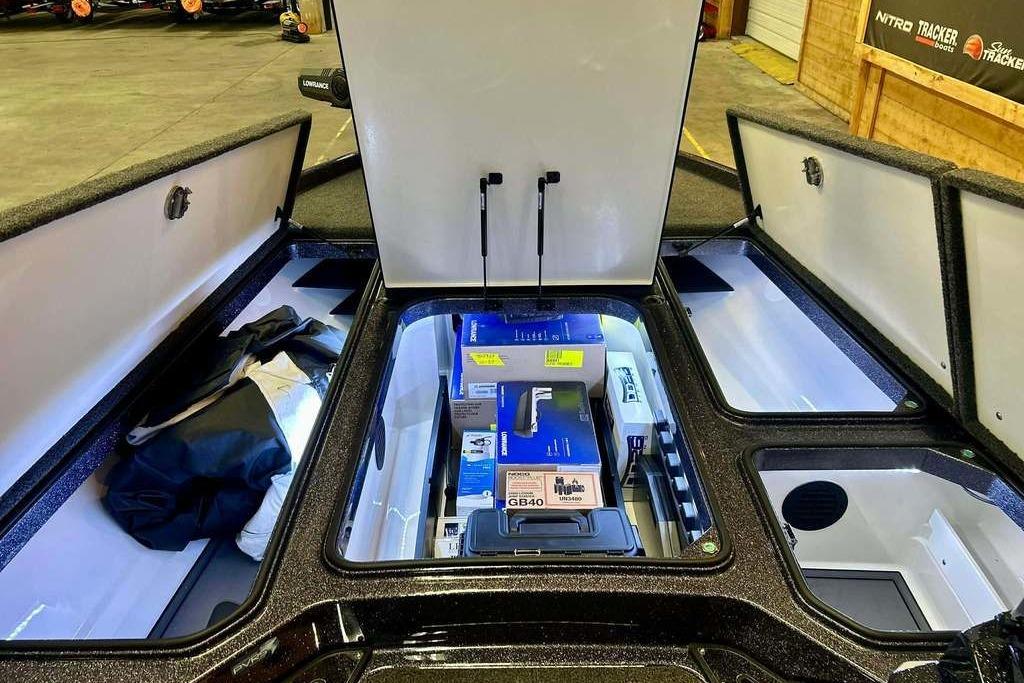 2026 Ranger Z521R Cup-Equipped boat storage compartments with gear and equipment.