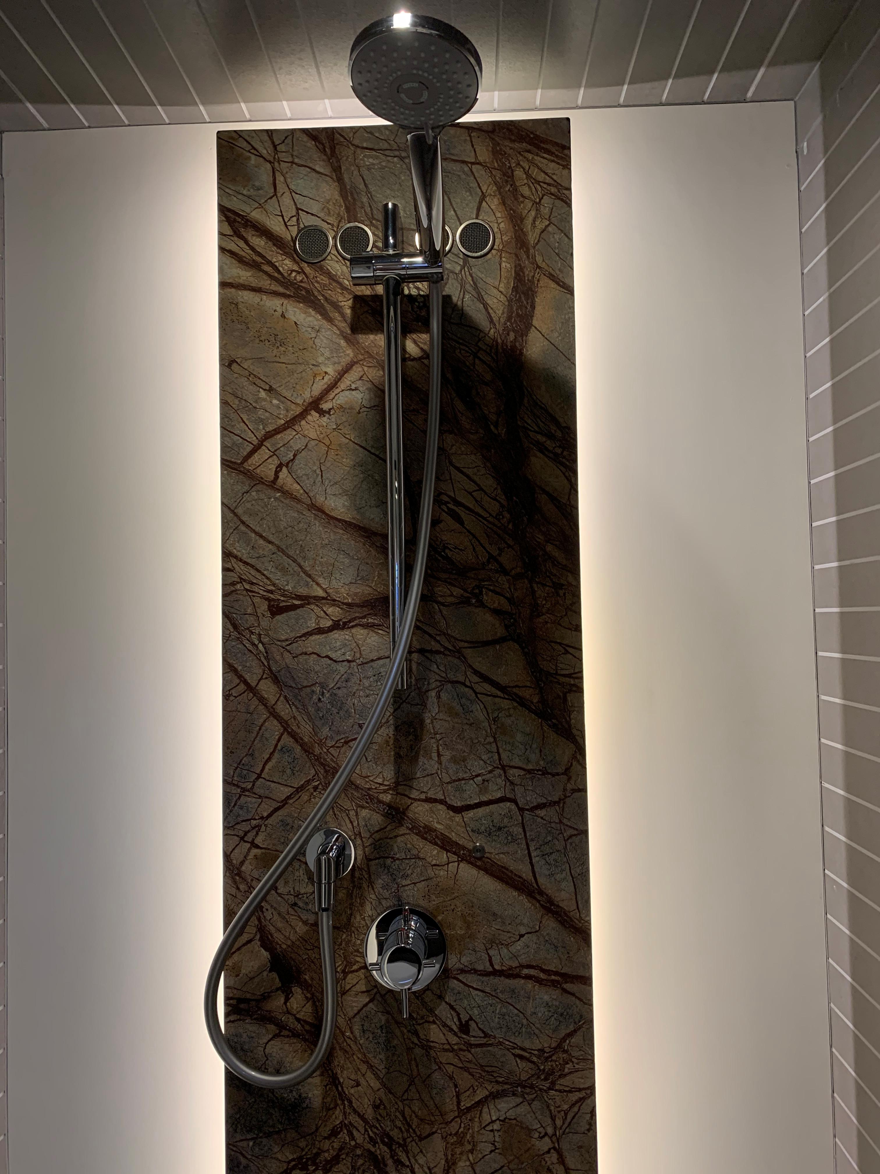 Luxury shower in 2019 Azimut 77S yacht with modern fixtures.