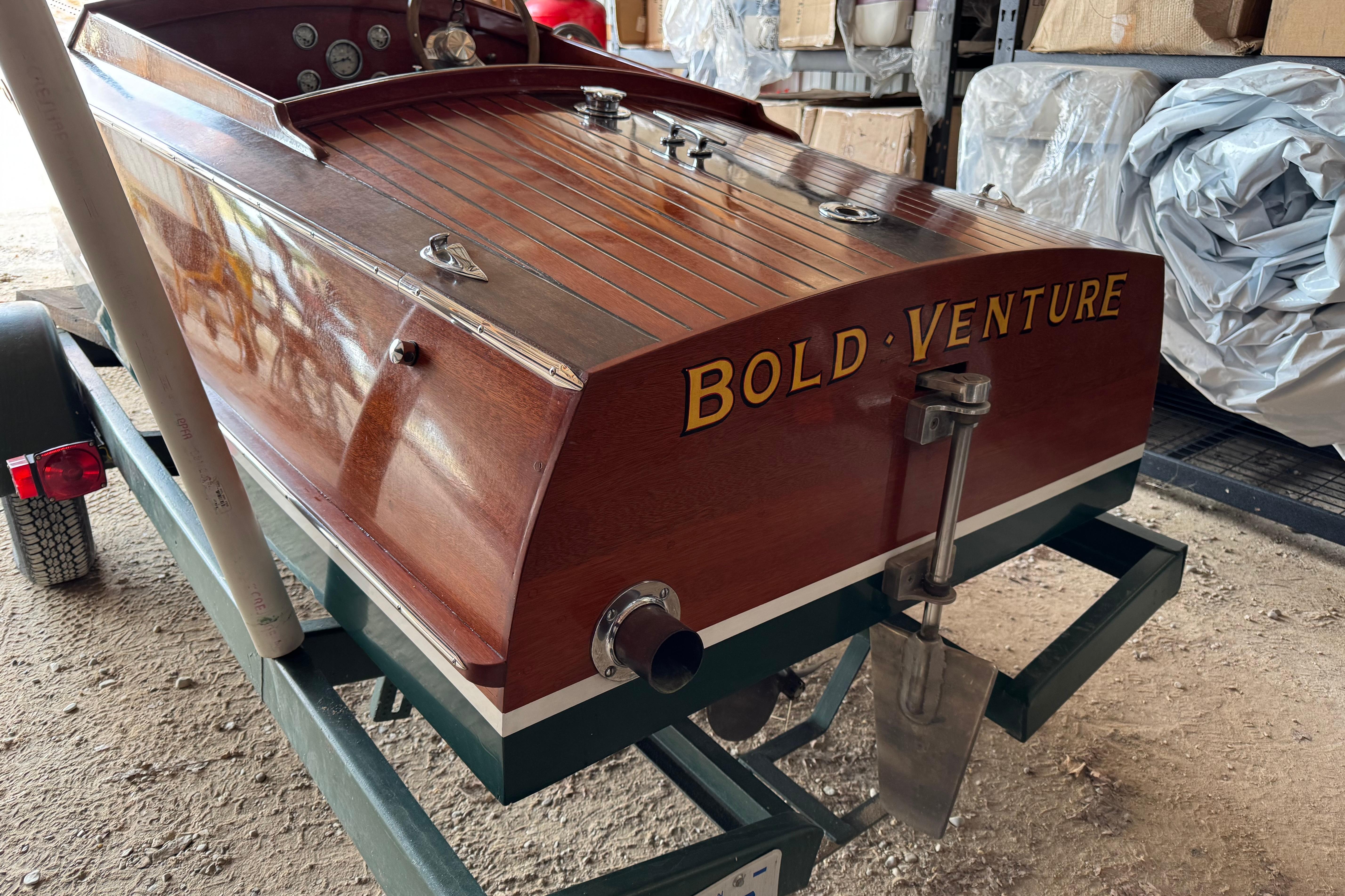 2010 Hacker-Craft Gentleman's Racer Replica, "Bold Venture," on trailer in storage.