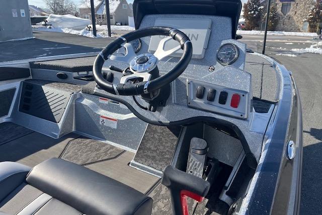 2026 Nitro Z19 XL Pro boat cockpit with steering wheel and control panel.