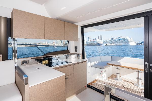 Interior of a Prestige 460 yacht with ocean view.