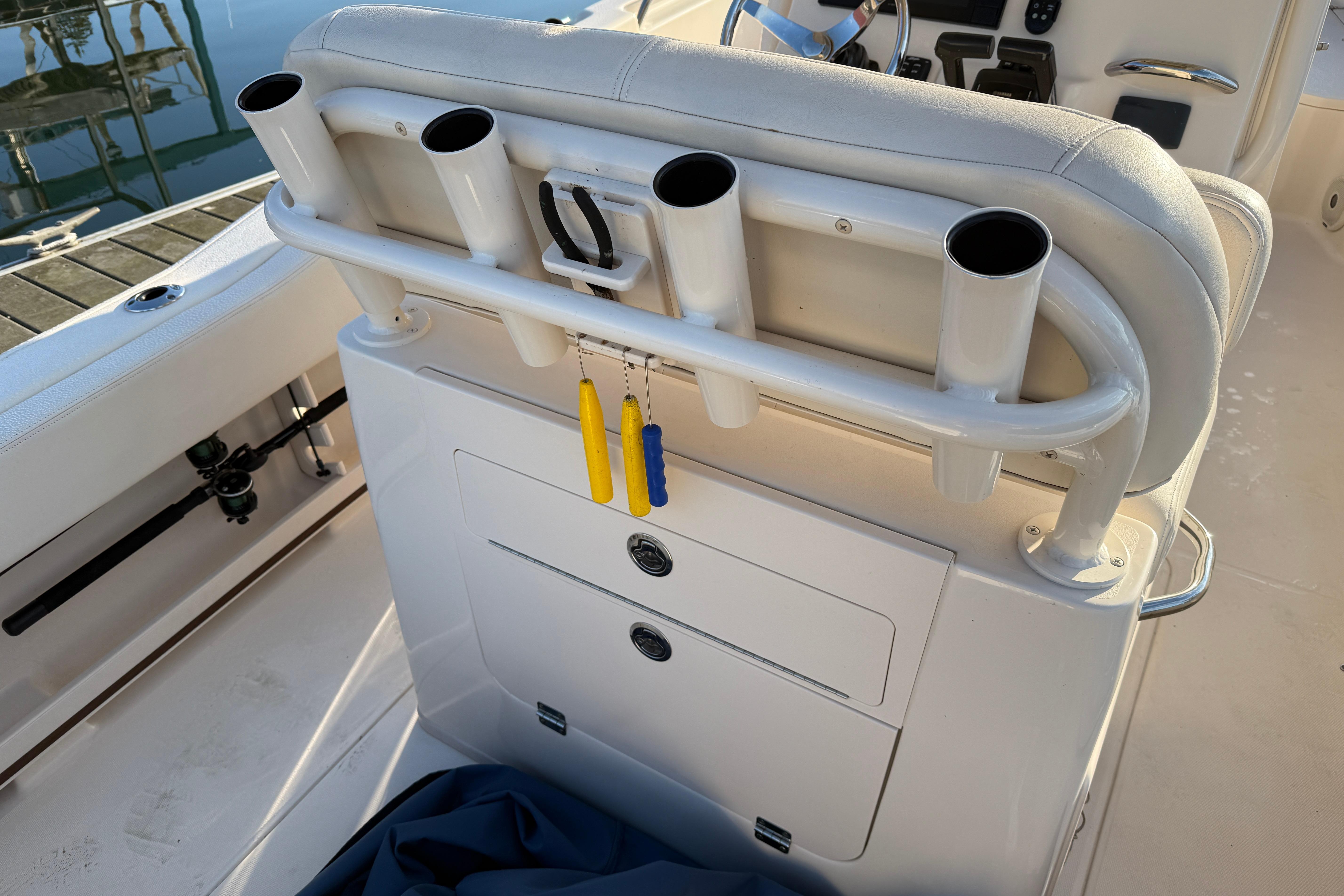 2017 Grady White 257 Fisherman boat interior with rod holders and storage compartments.