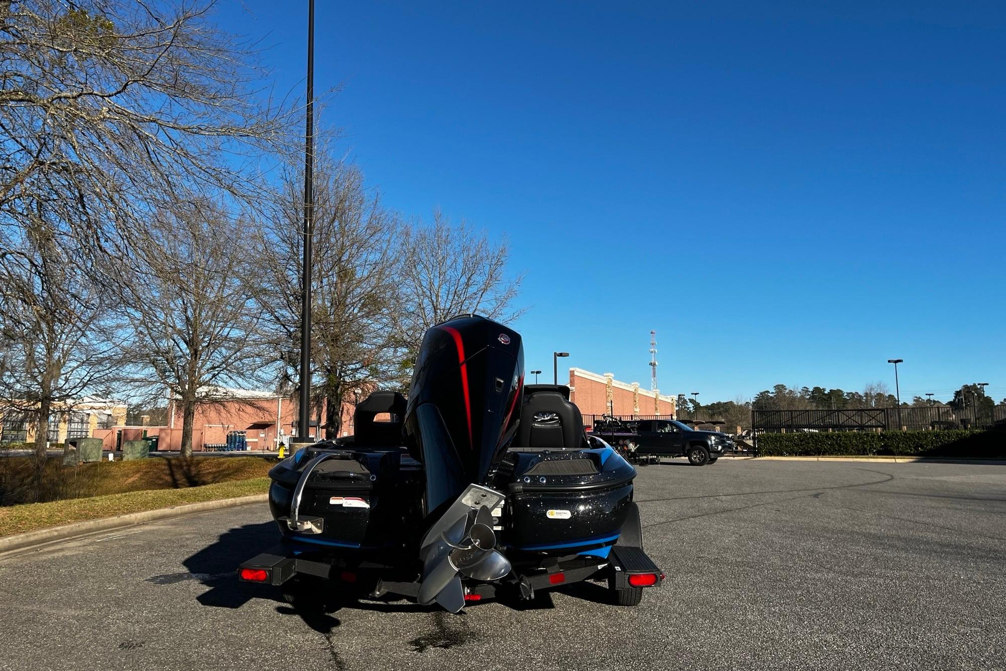 2024 Nitro Z19 boat parked outdoors on a sunny day, showcasing its sleek design.