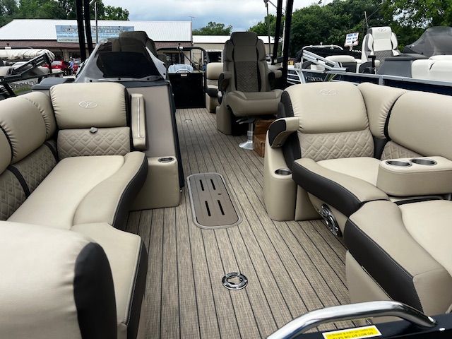 Interior of a 2023 Veranda VP22RCT pontoon boat with luxurious seating.