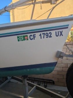 Catalina Capri 2002 sailboat on trailer, side view.