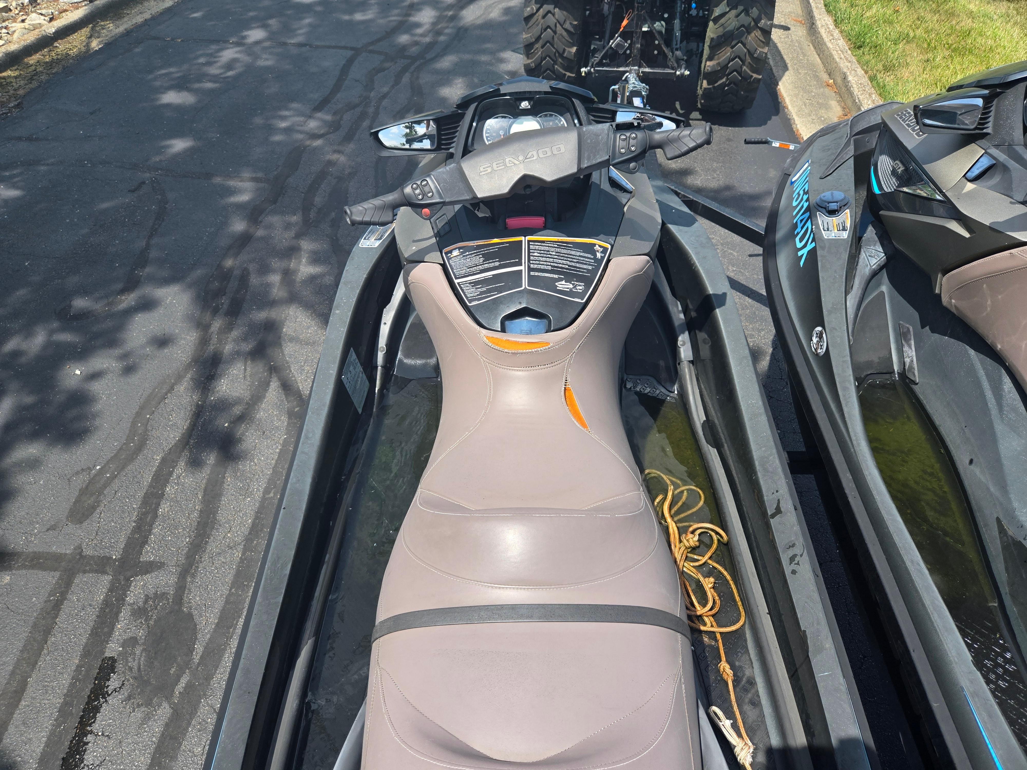 2016 Sea-Doo GTX Limited iS 260 jet ski parked on pavement.