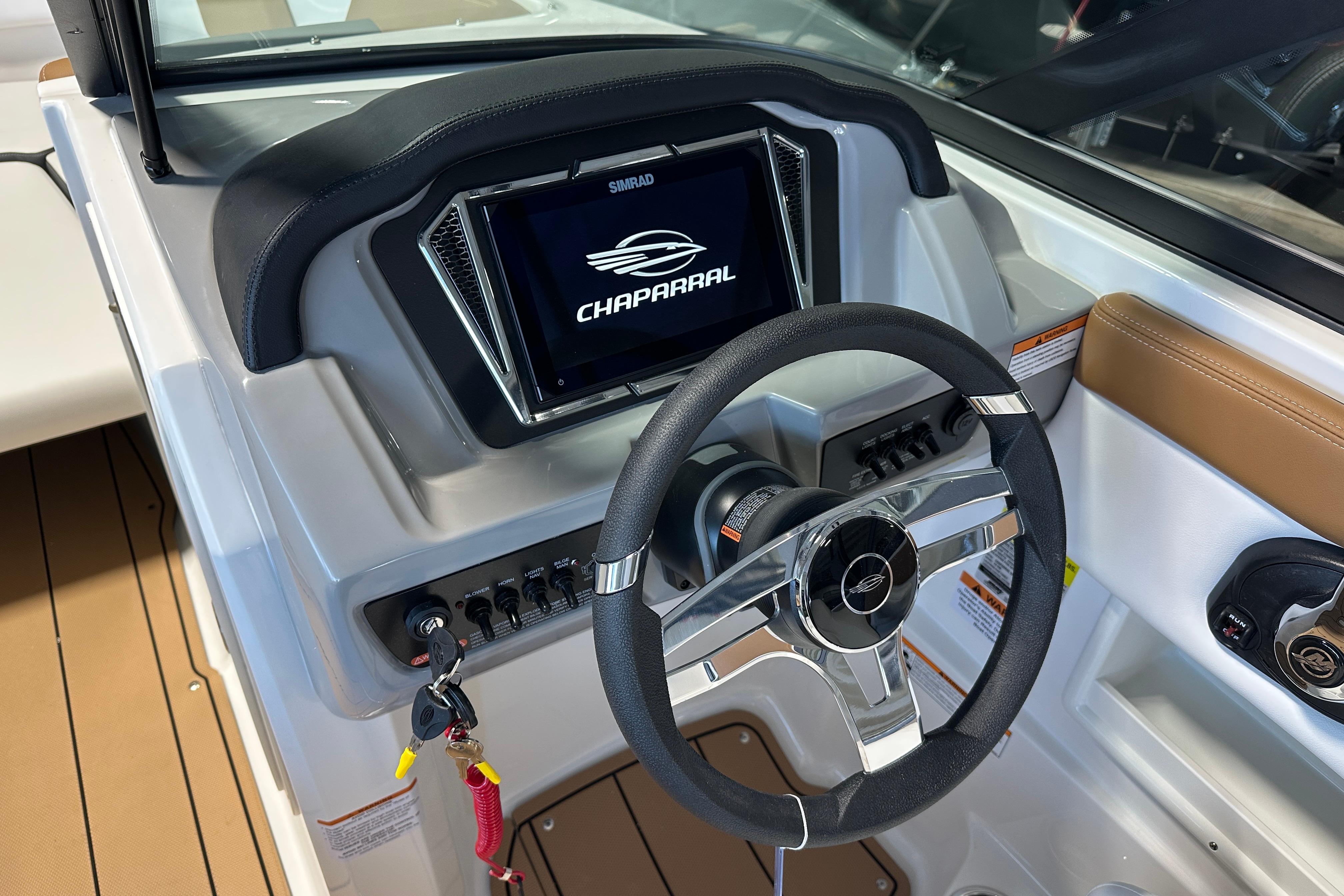 Chaparral 23 SSi 2026 helm with steering wheel and display.