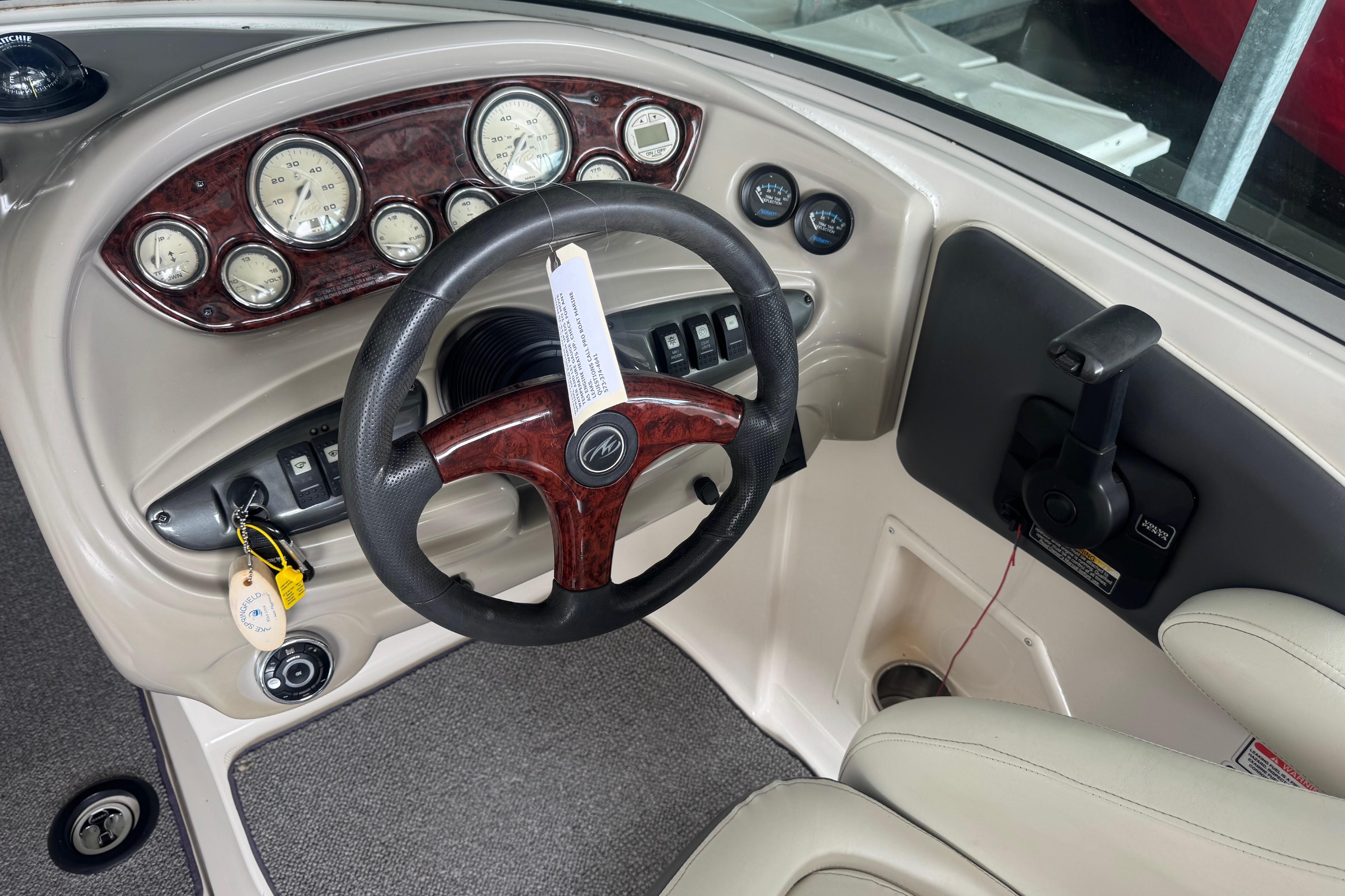 2005 Monterey 248LS Montura Bowrider dashboard with steering wheel and gauges.
