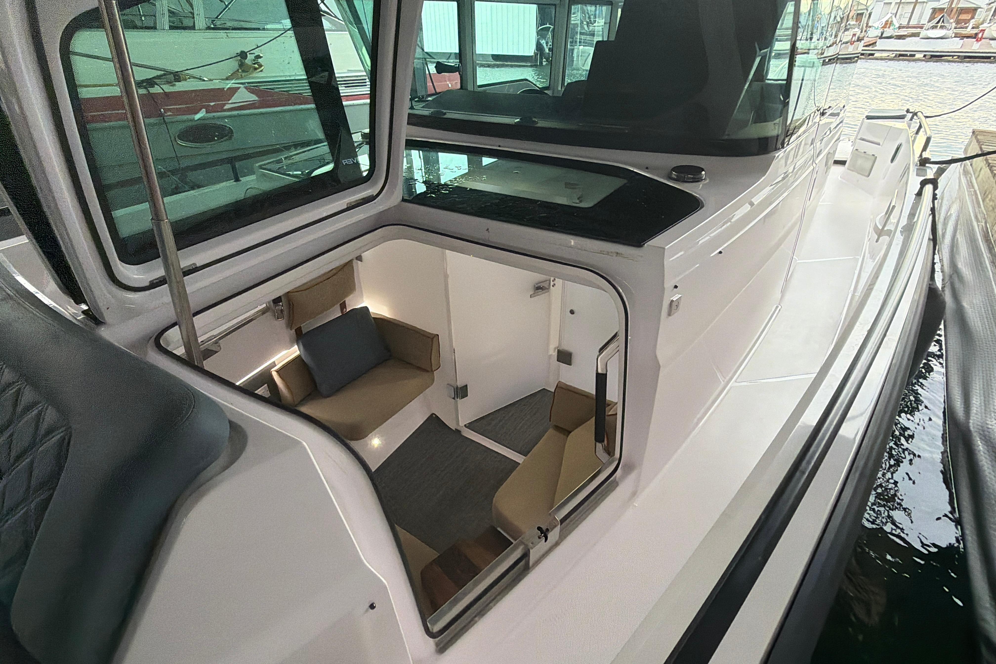 2022 Axopar Brabus 37 XC Cross Cabin interior view with seating area.