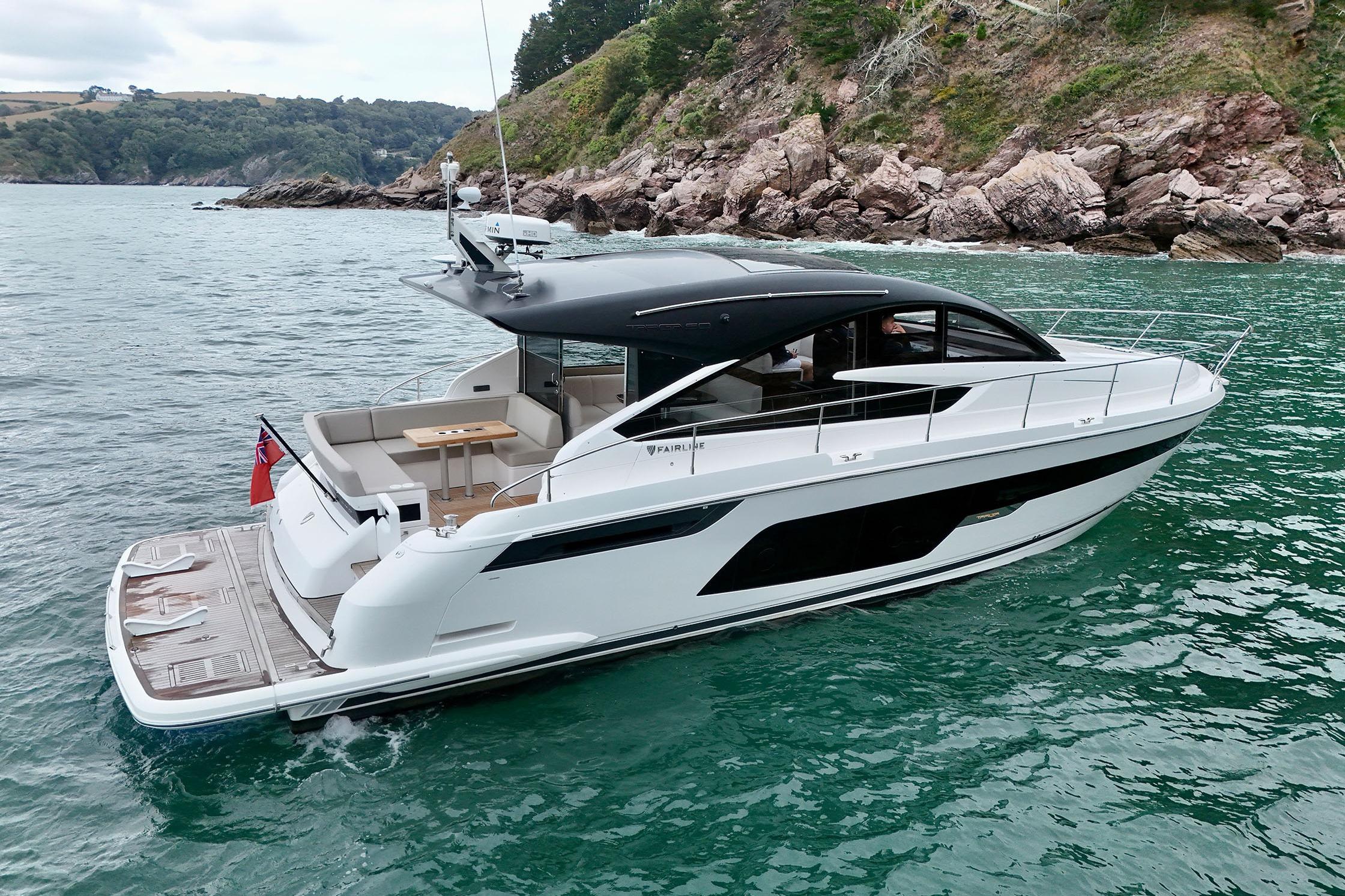 2022 Fairline Targa 50 GT yacht cruising in scenic coastal waters.