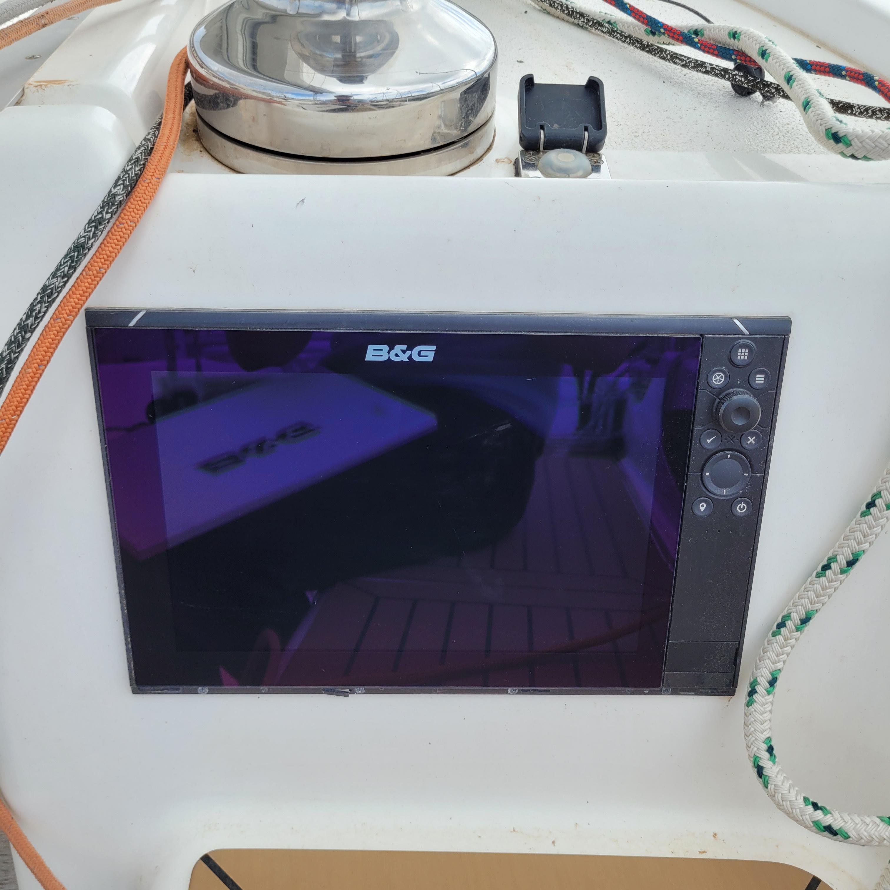 B&G navigation display on 2015 Dragonfly 32 Supreme sailboat, surrounded by ropes.