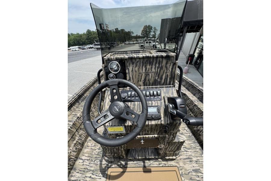 2027 Excel 230 Bay Pro Elite boat dashboard with steering wheel and controls.