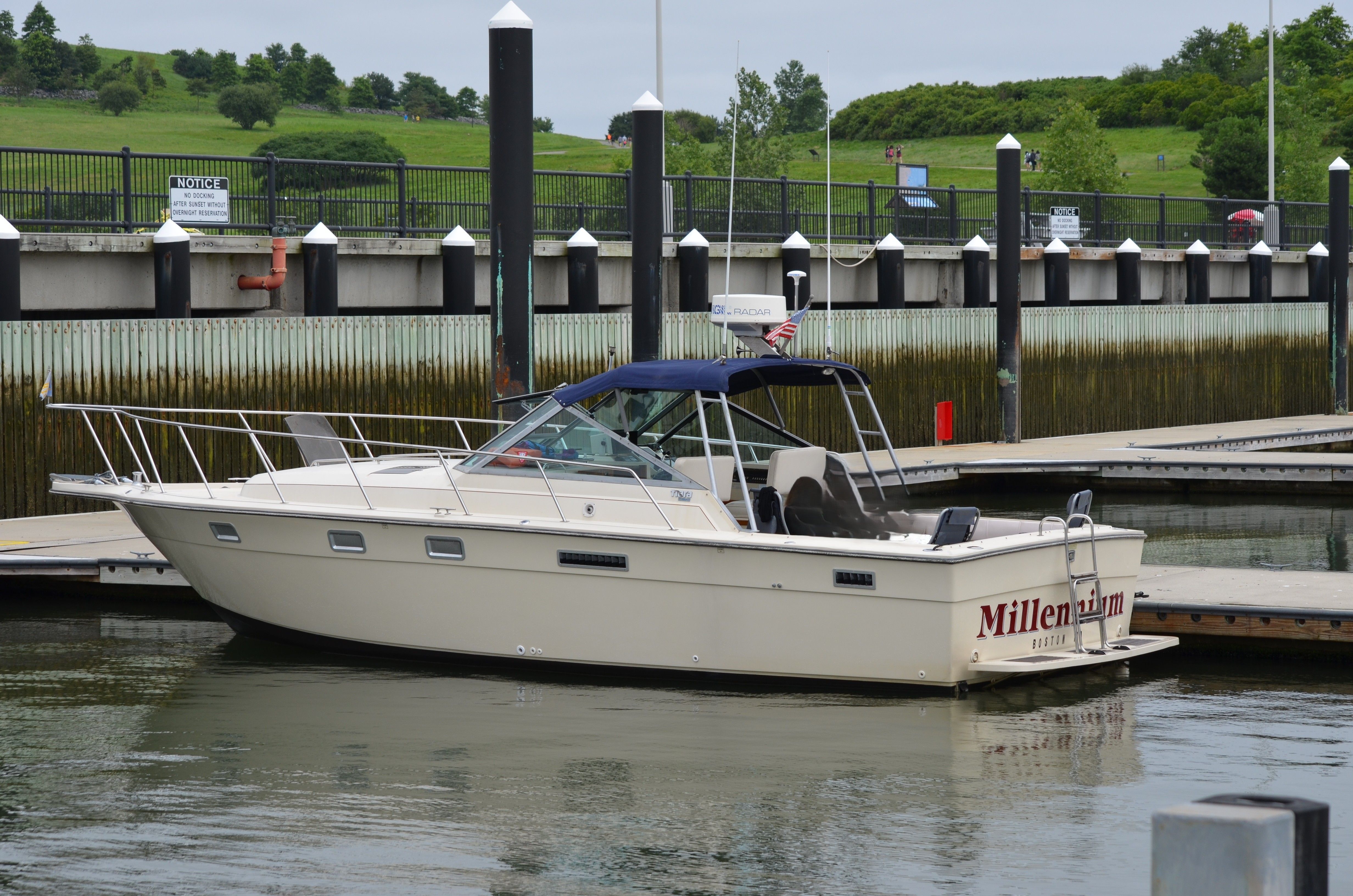 1985 Tiara Yachts 3100 Open docked at marina.