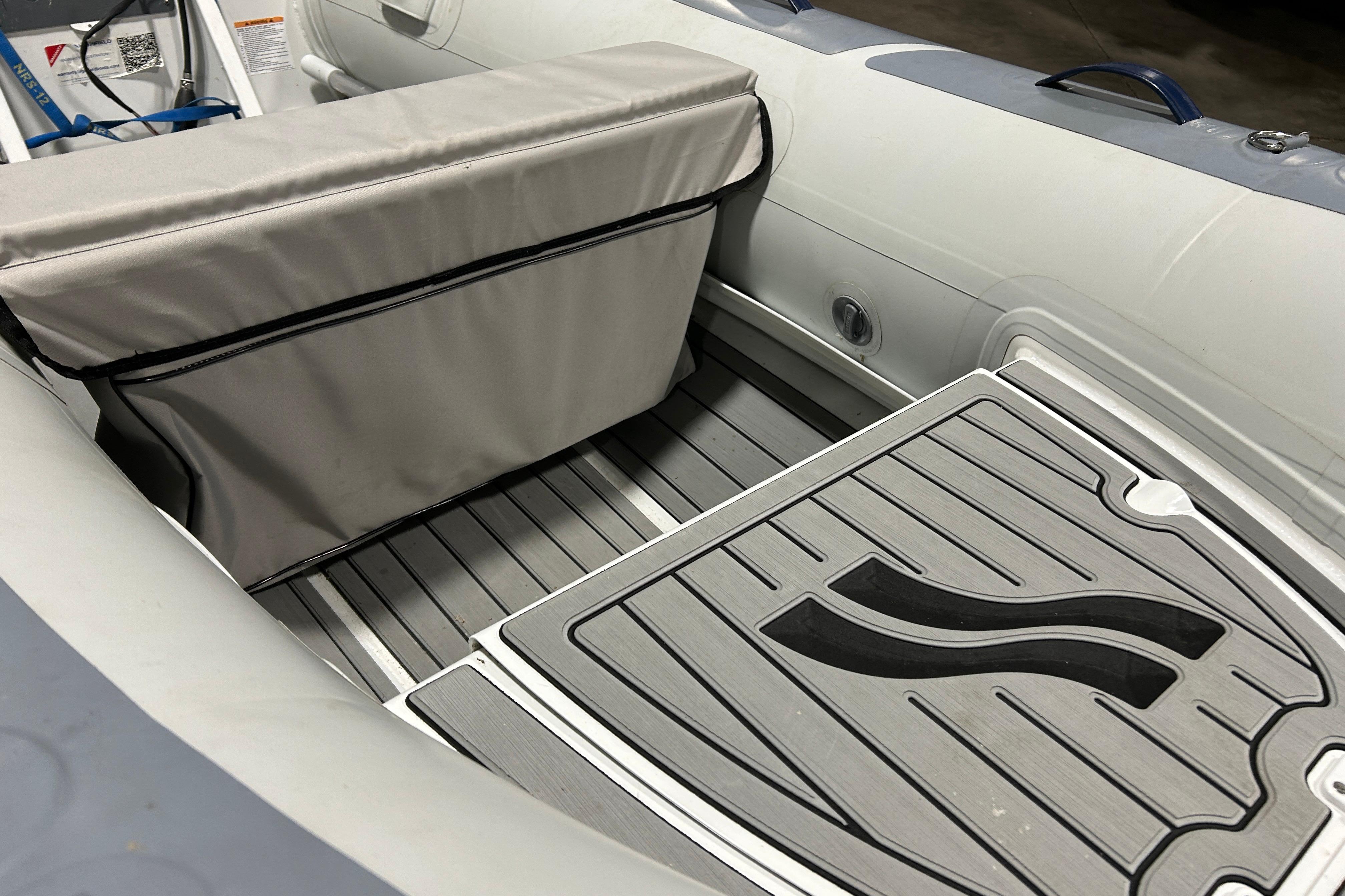 2023 Highfield Classic 310 inflatable boat interior with cushioned seating and non-slip flooring.
