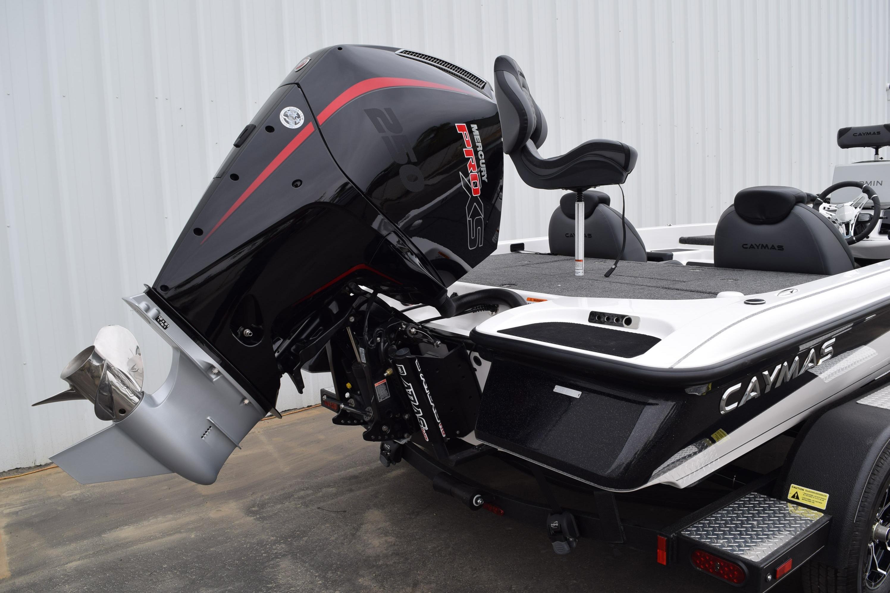 2027 Cayams CX 20 Pro boat with Mercury Pro XS engine, parked outdoors.