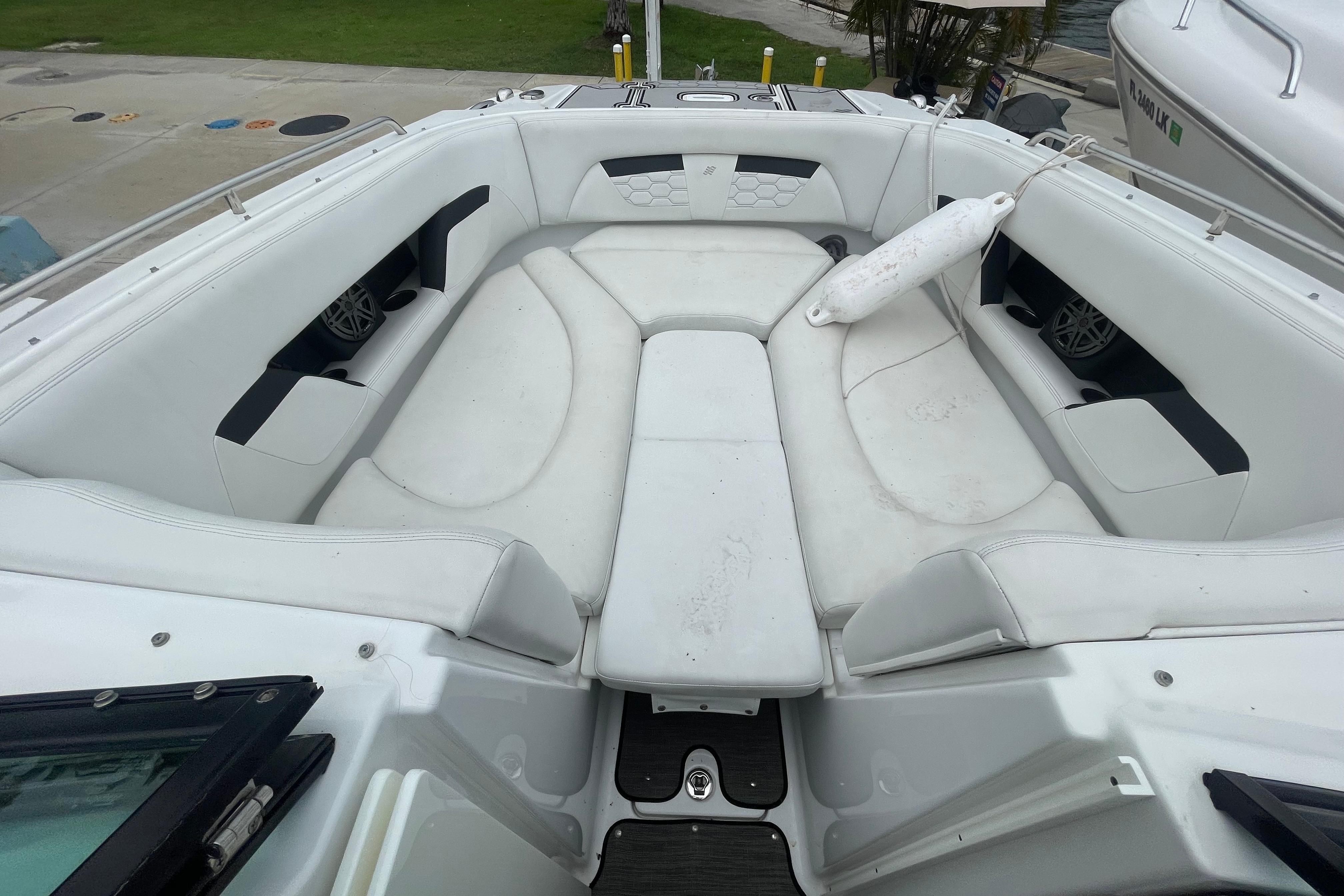 2022 Four Winns HD8 OB boat interior with spacious white seating area.
