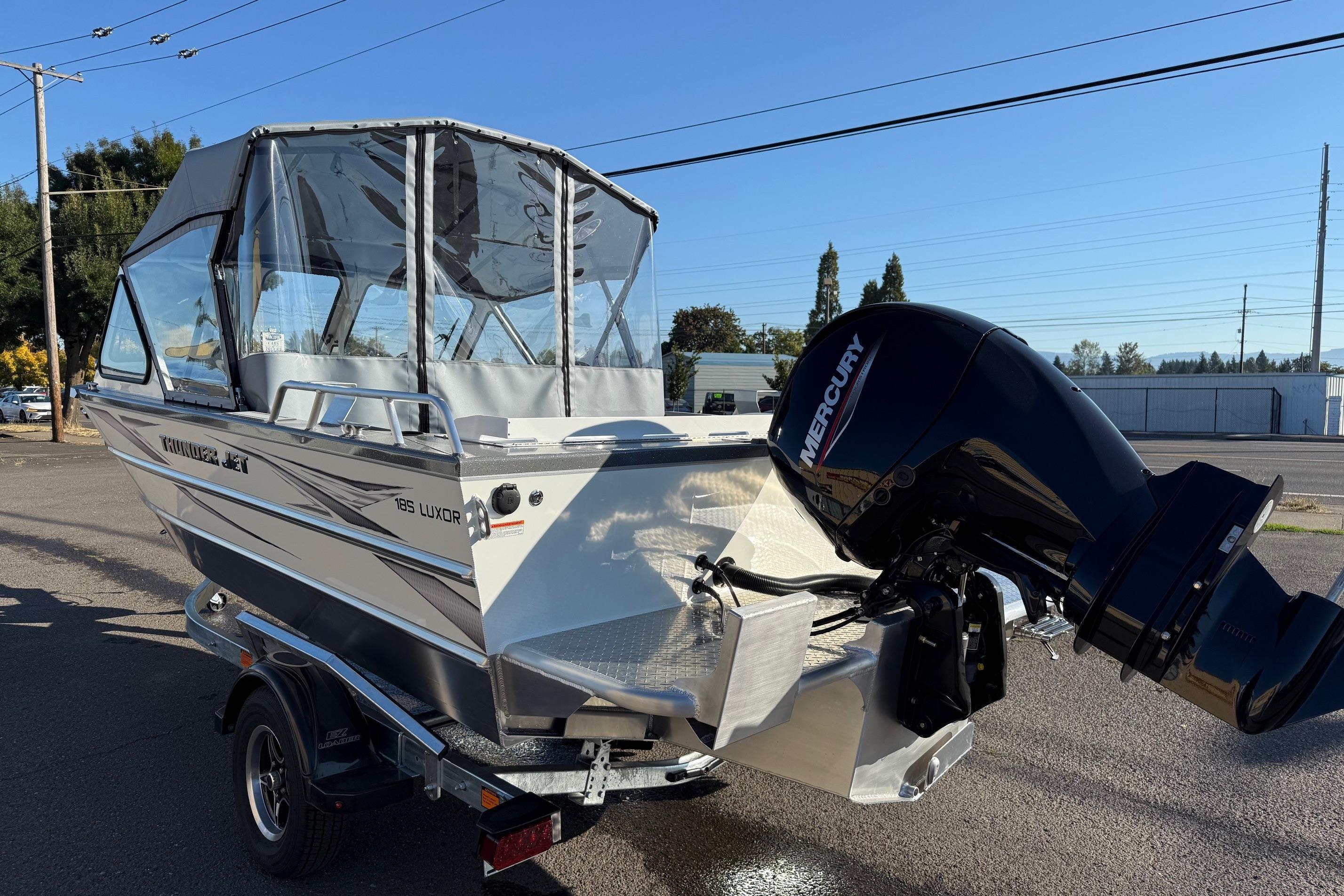 2026 Thunder Jet 185 Luxor boat with Mercury outboard motor on a trailer.
