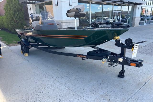 2026 Tracker Bass Tracker Classic Limited boat on trailer, parked outdoors.