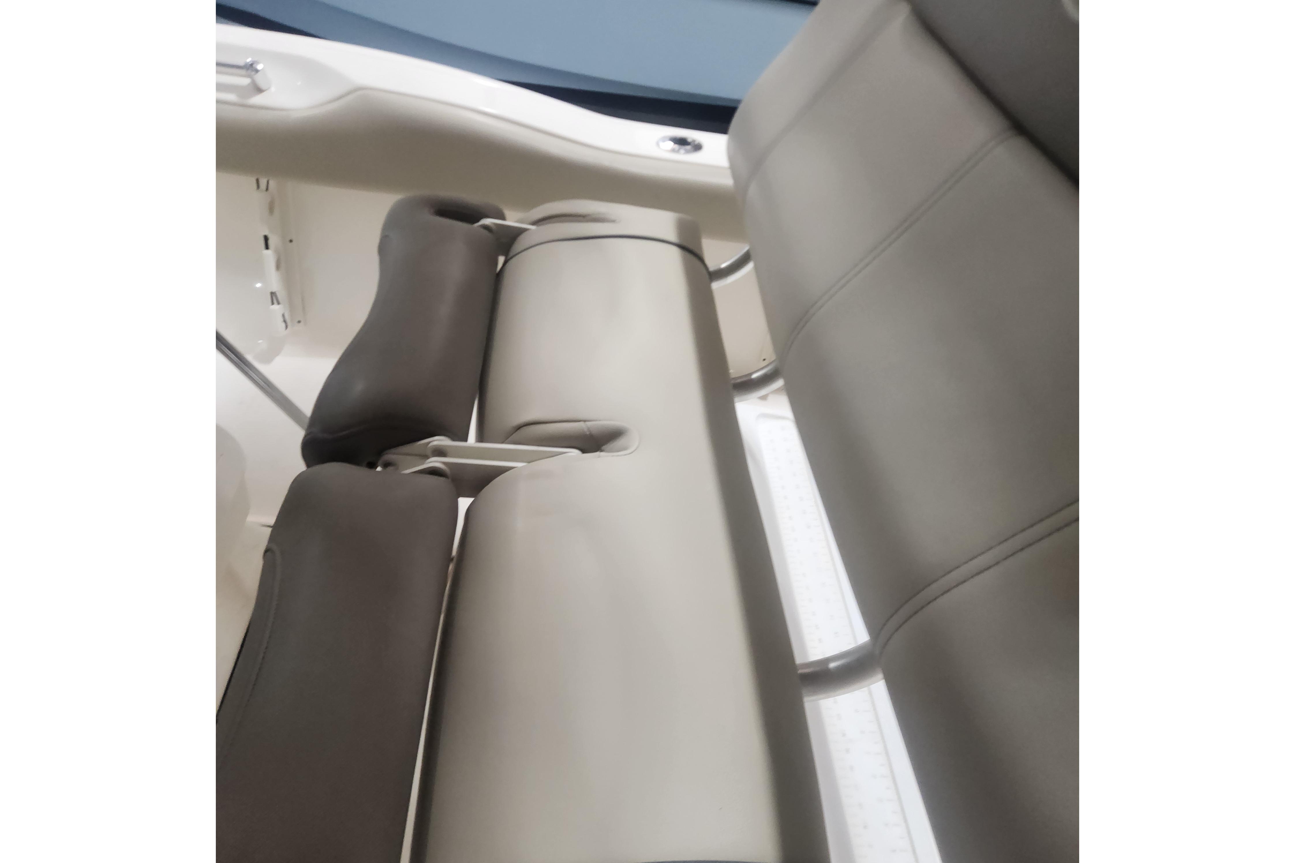 2023 Key West 219 FS boat interior seating detail, featuring cushioned seats.