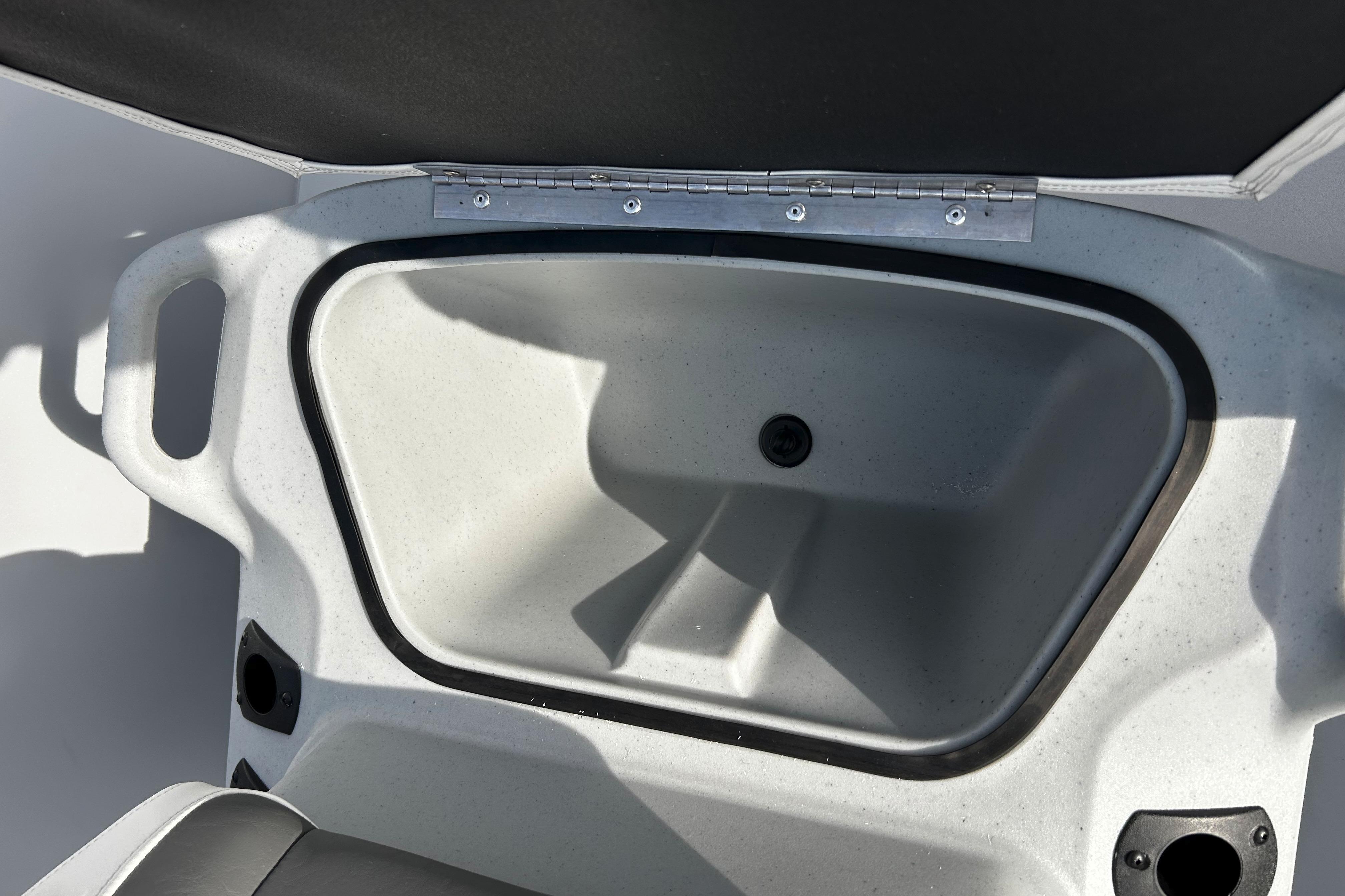 Open storage compartment in 2026 Tracker Bass Tracker Classic CC boat.