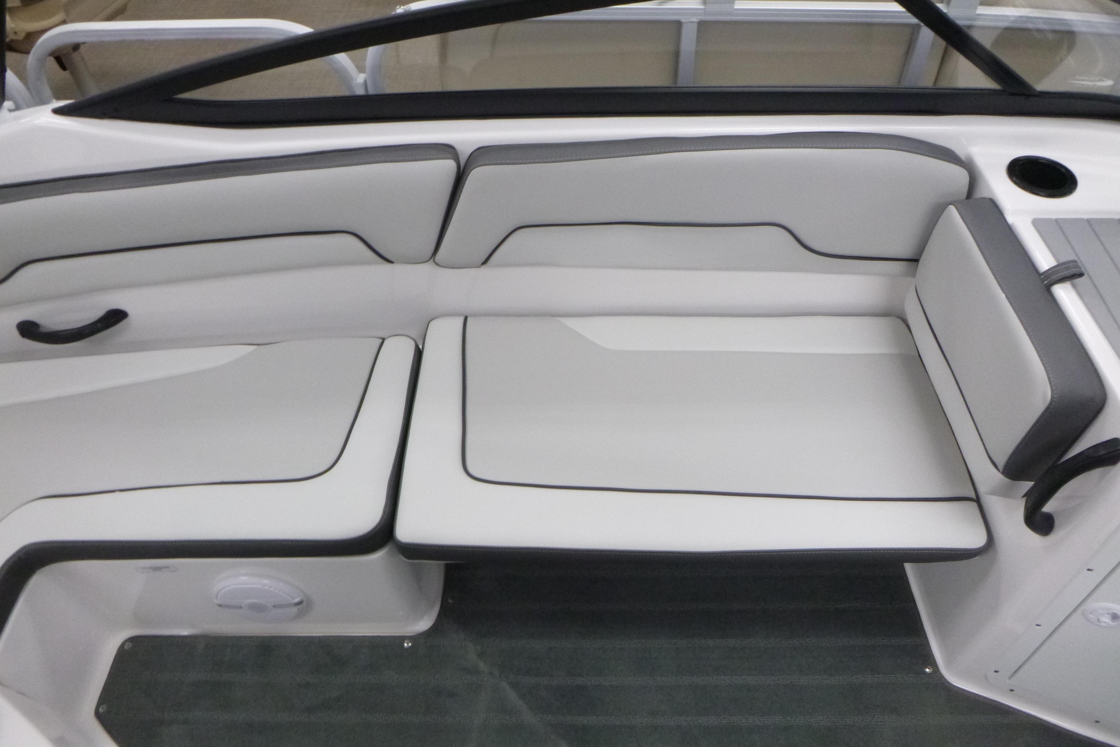 2026 Yamaha AR190 boat interior with sleek white seating and black accents.
