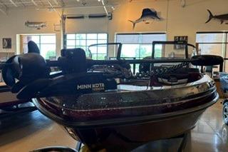 2026 Ranger 1850MS boat in showroom, featuring Minn Kota trolling motor.