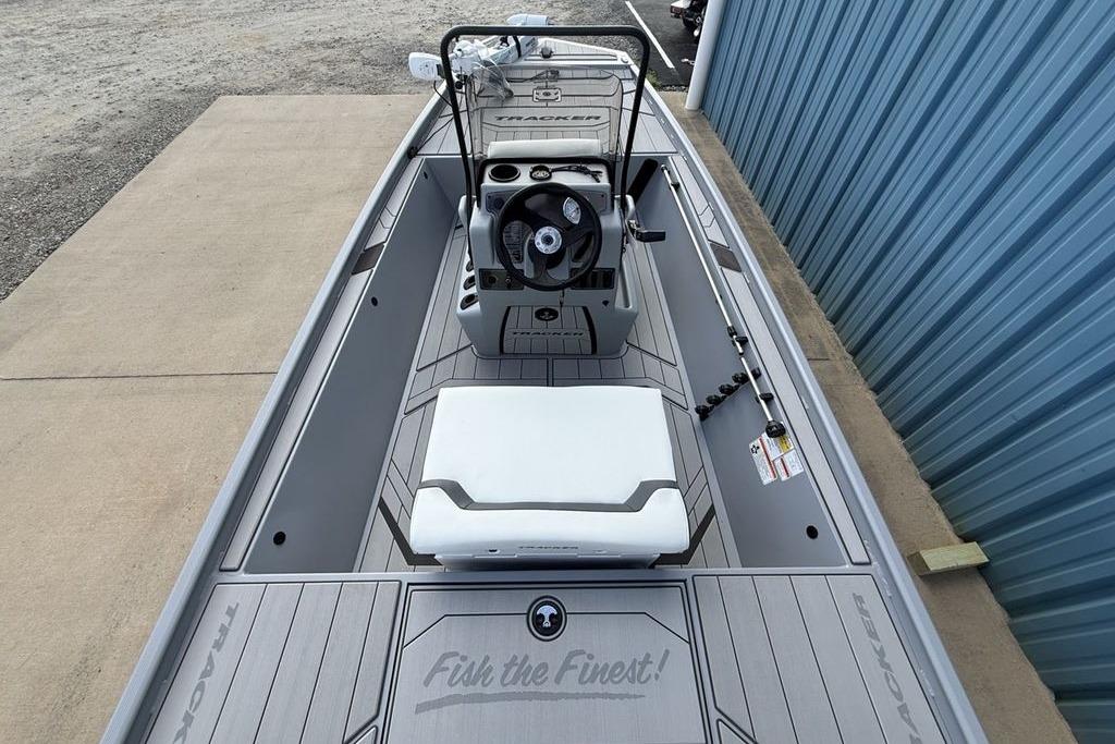2026 Tracker Bass Tracker Classic CC boat interior with steering console and seating.