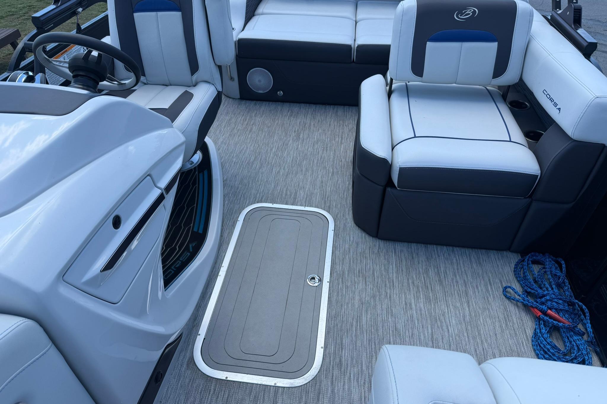 Interior of 2023 Barletta Corsa 23U boat with plush seating and modern design.