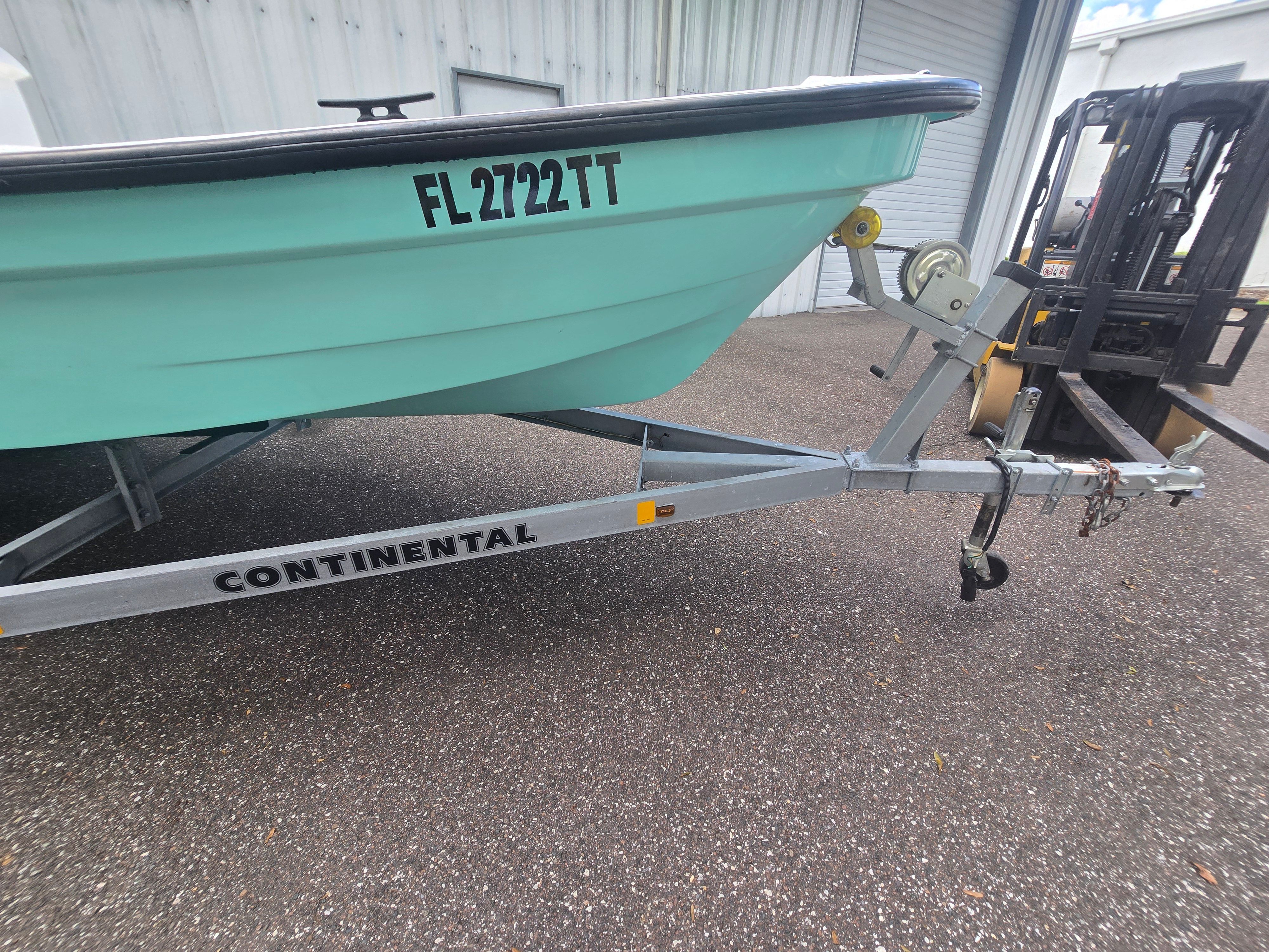 Panga Eduardono 2022 on Continental trailer, Florida registration.