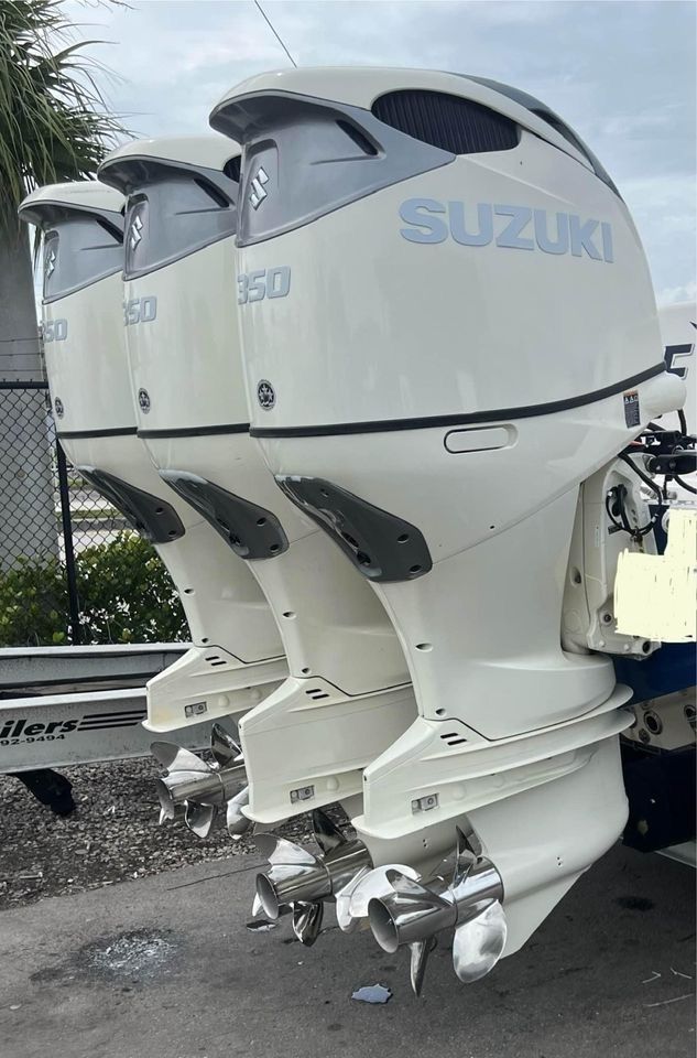 Three Suzuki 350 HP outboard motors on a Venture 39 Open boat.