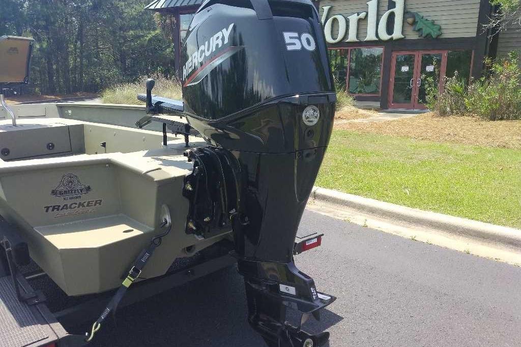 2026 Tracker Grizzly 1650 T Prairie Wings Edition boat with Mercury 50 outboard motor.