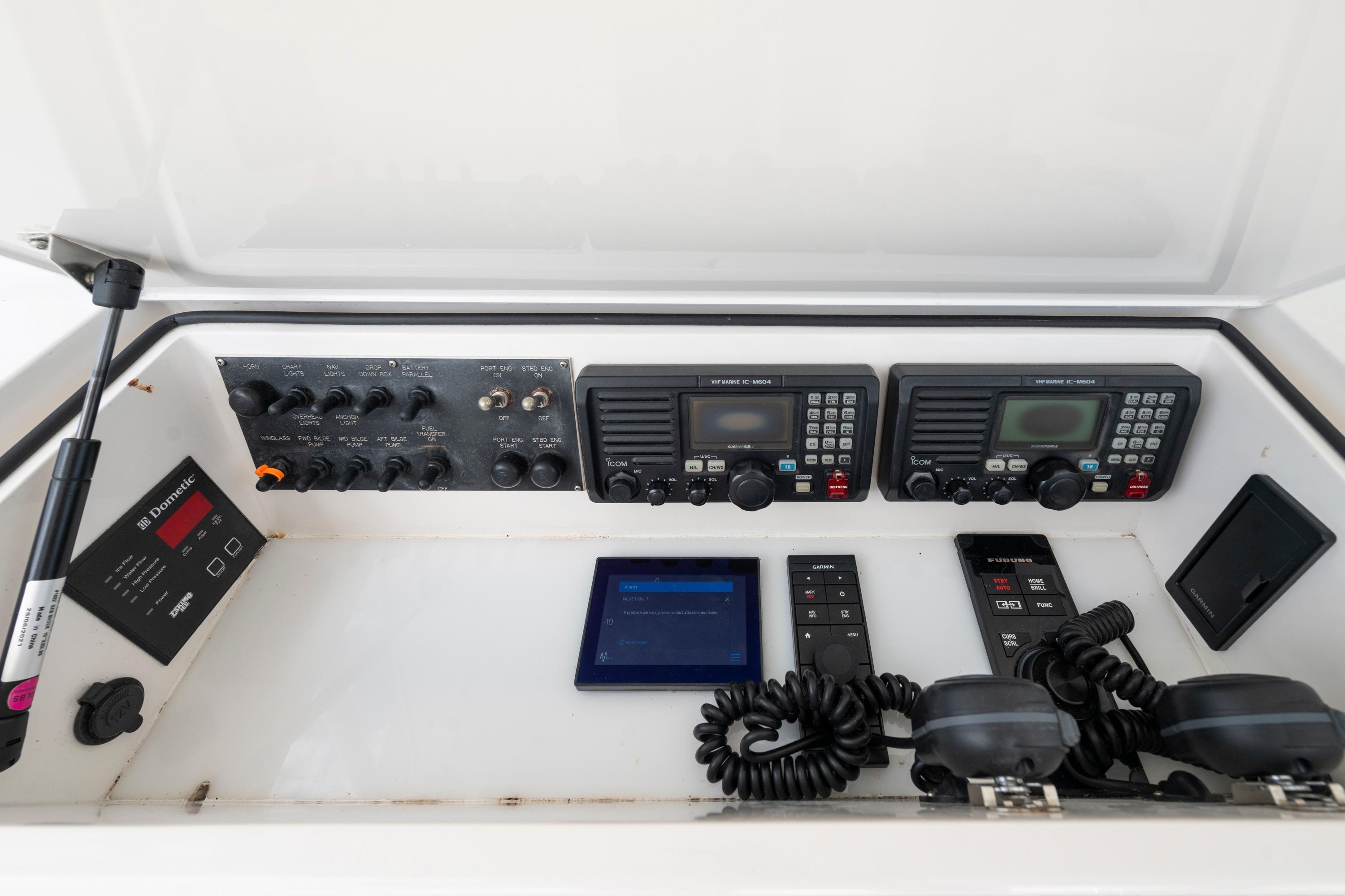 Control panel of a 2009 Viking 50 Convertible yacht with communication equipment.