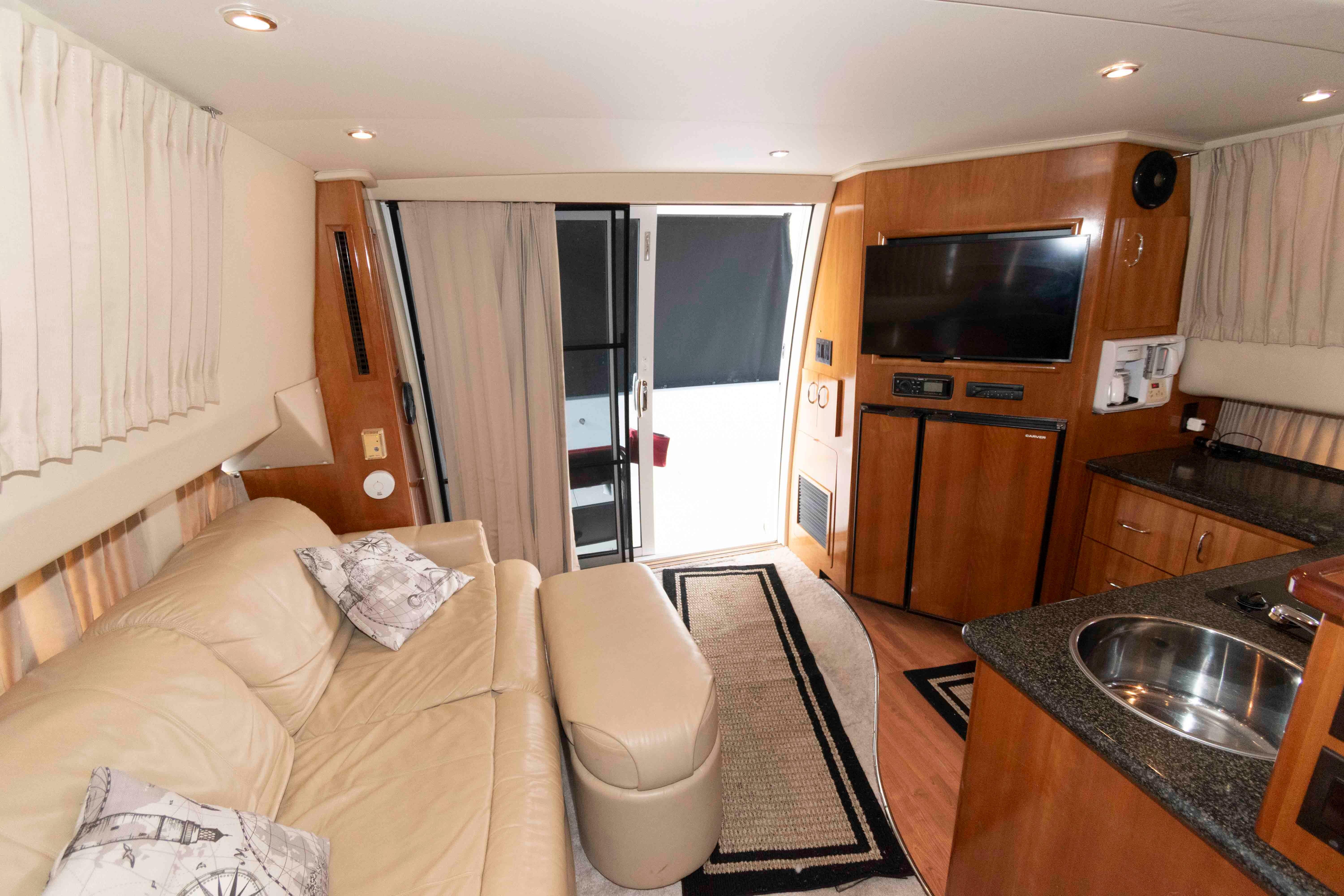 Interior of 2005 Carver 360 Sport Sedan with leather seating and modern amenities.