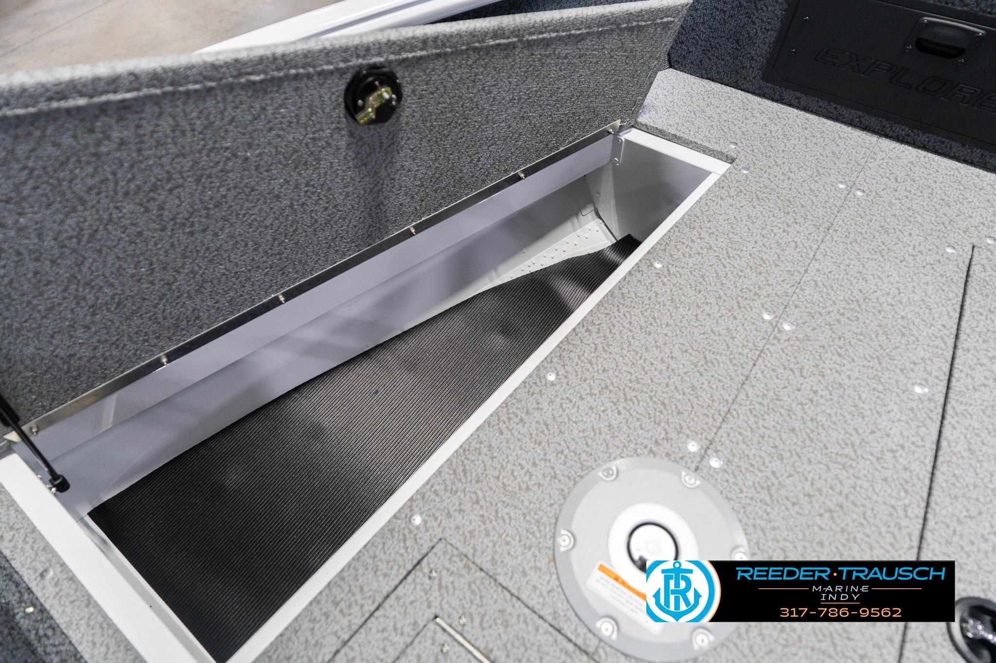 Open storage compartment in 2026 Lund 1700 Explorer Sport boat interior.